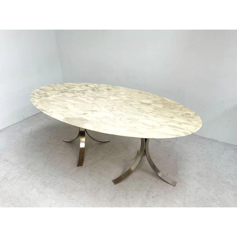 Marble Dining Table Attr. to Osvaldo Borsani

Italian marble table in the style of Osvaldo Borsani. The table features a beautiful marble top and two geometrical feet. Osvaldo Borsani is a top Italian designer best known for the lounge chairs we