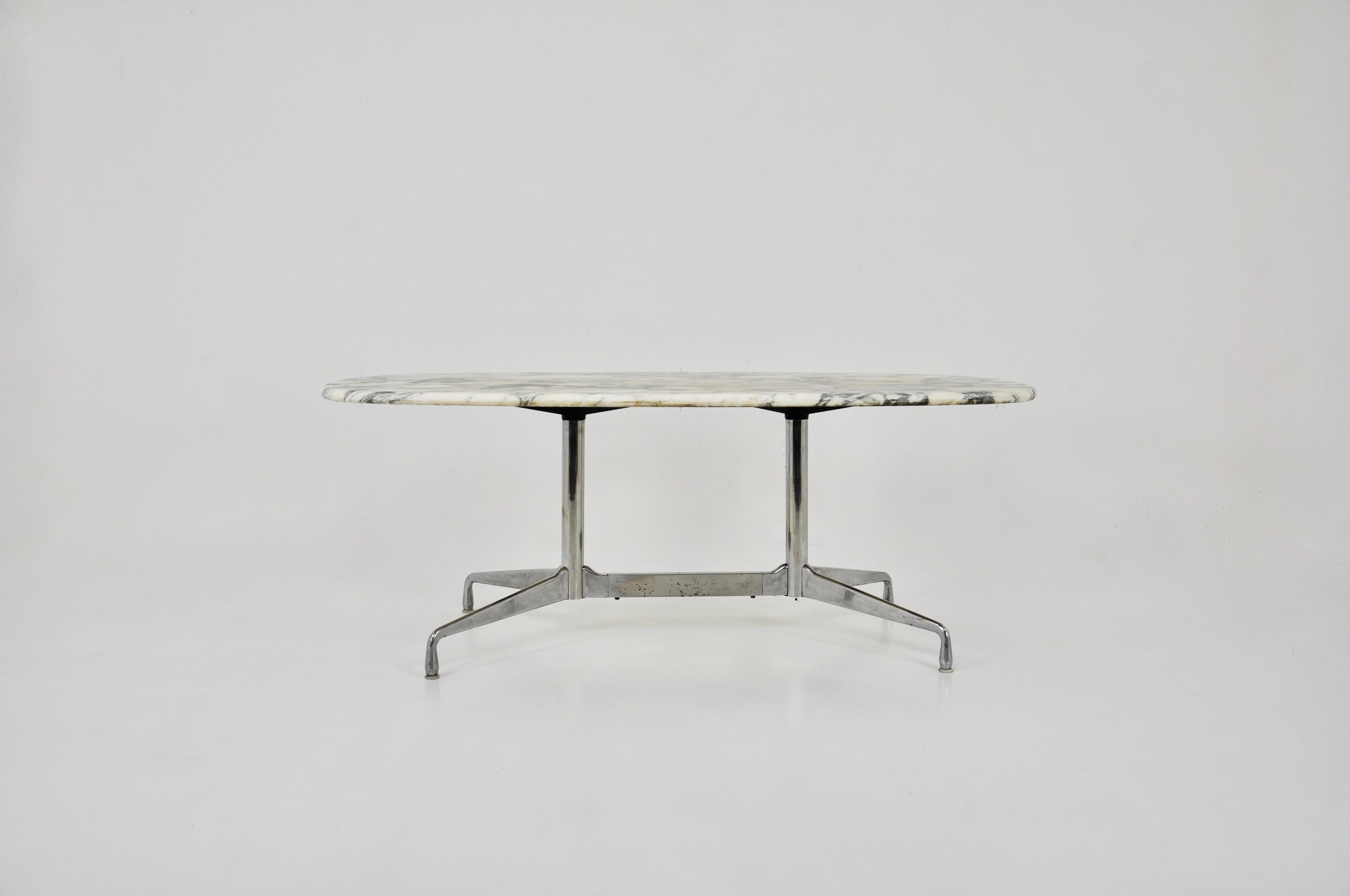 Carrara marble table. Wear due to time and age of the table.
 