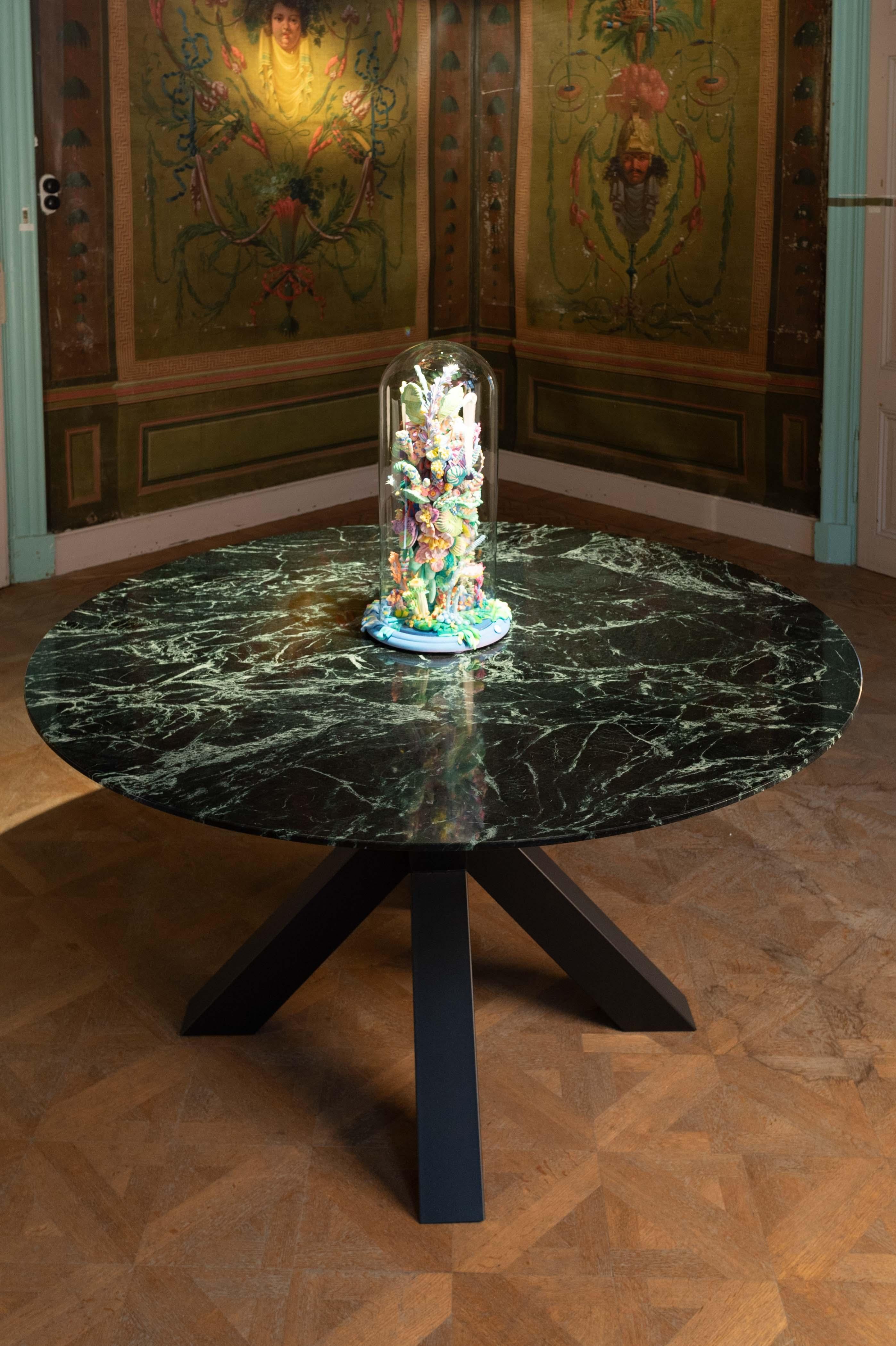 Marble dining table in Api verdi colour. 