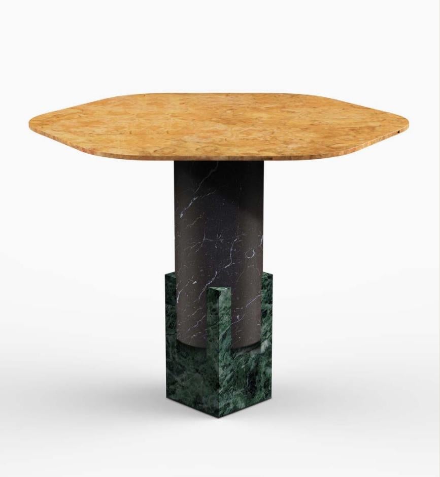 Marble Dorik bistro table by Oeuffice
Edition of 12
Materials: Gialle Reale marble, Marquinia black marble, Alpino green marble
Dimensions: L 80 x W 86 x H 71 cm

Kapital is a series of limited edition tables and stools based on essential