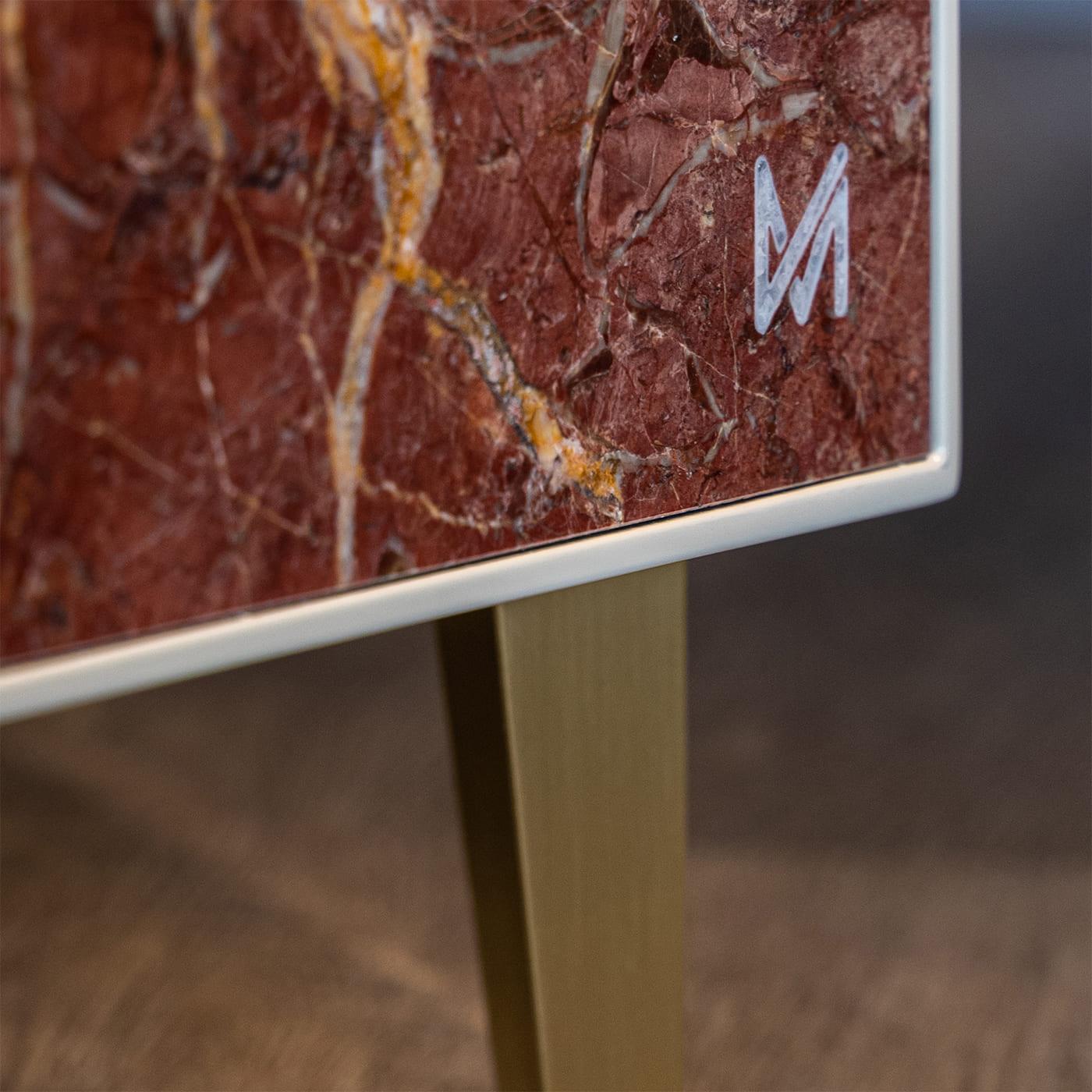 Part of the Marmo Collection by Marzia Boaglio, this Esplosione cabinet will create a dynamic accent in a sophisticated modern interior with its dazzling rose-hued abstract design. Showcasing masterfully crafted marble cone inlays on a rectangular