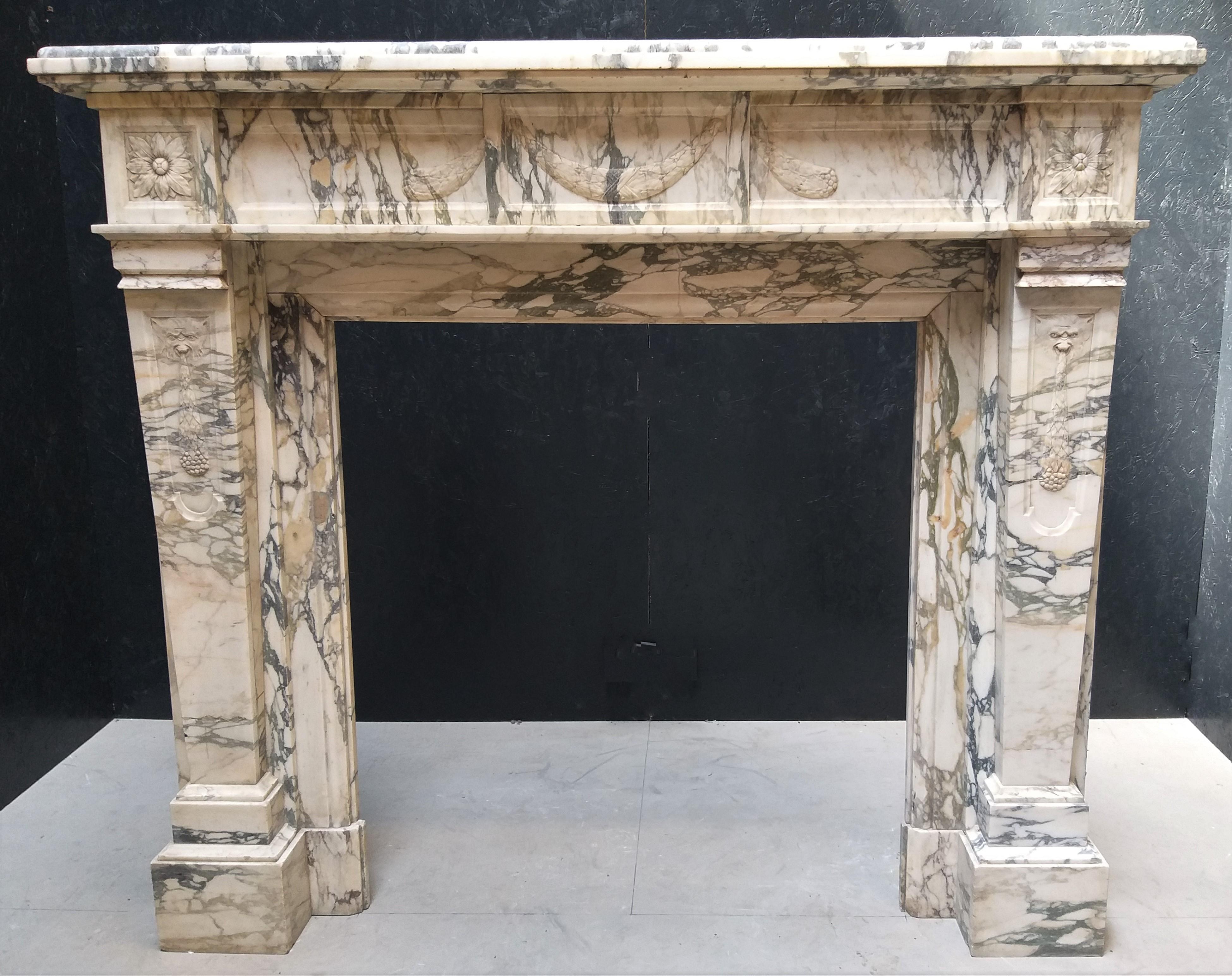 This marble fireplace, made out of the Italian Brècie Serravezza is clearly not in the style of Louis XIV, XV or XVI and not Régency, Edwardian, Philippe or Empire. It's another one..! We are always happy to find 'Another one': Aparte!  Found in a