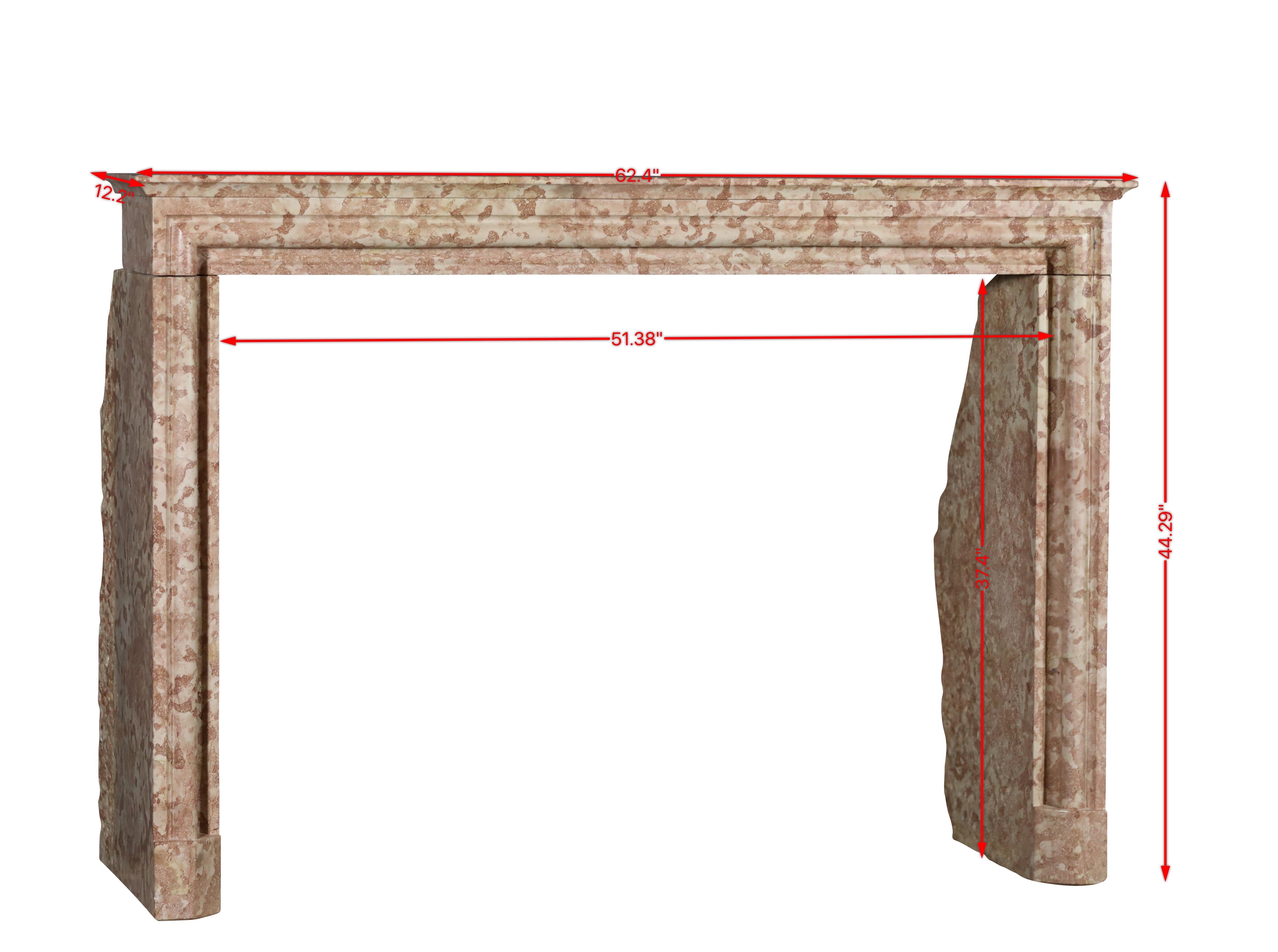 Unusual castle stone mantel with straight lines for a timeless interior.
This stunning 19th-century French fireplace frame showcases the refined elegance of period craftsmanship. Reclaimed from the historic city of Beaune, it features a striking