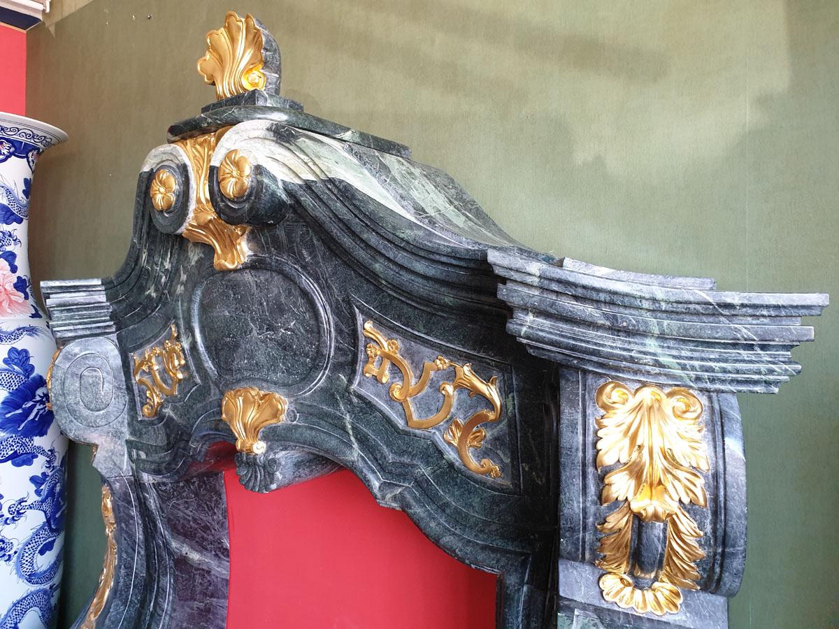 European Marble Fireplace Portal in the Style of Mature Baroque, Carved and Gilded For Sale