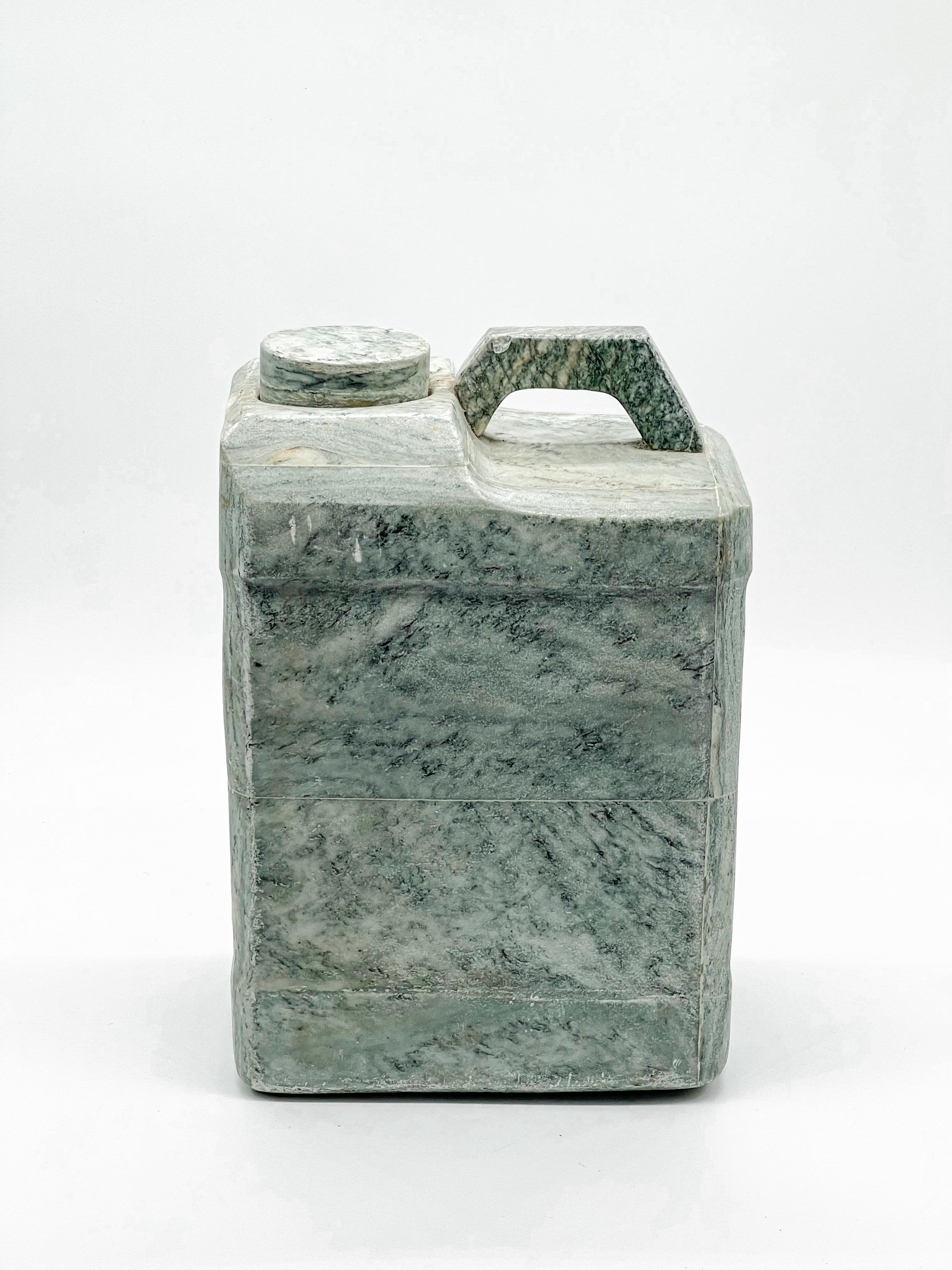 Decorative Marble Sculpture - Marble Fuel Tank - Collectible Interior Art

Offered for sale is an uncommon and possibly unique piece of decorative art: a functional fuel tank in plastic, entirely clad in light green marble (Antigua Green Marble).