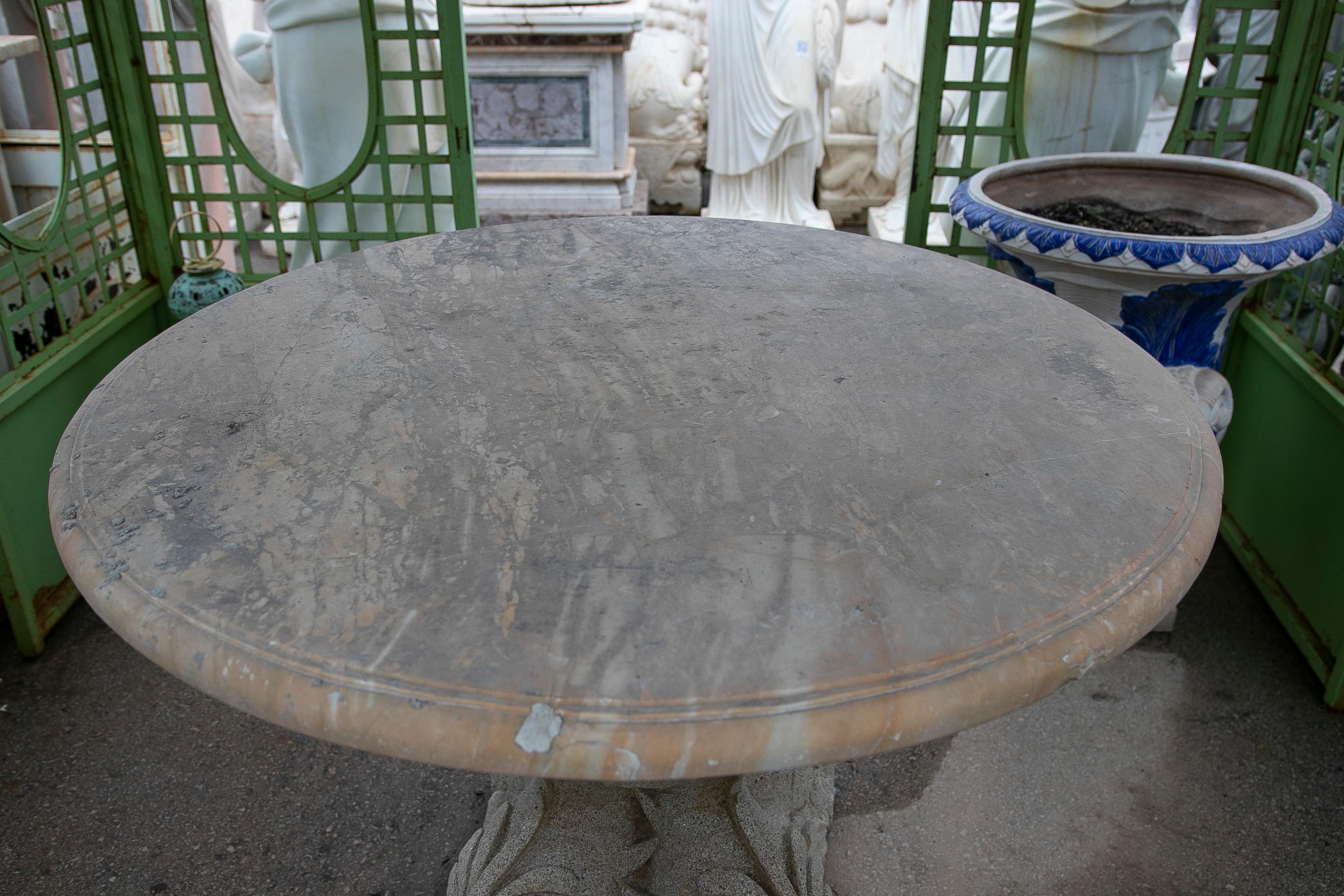 Spanish Marble Garden Table with Rose Portuguese Marble Top and Stone Base with Fishes For Sale