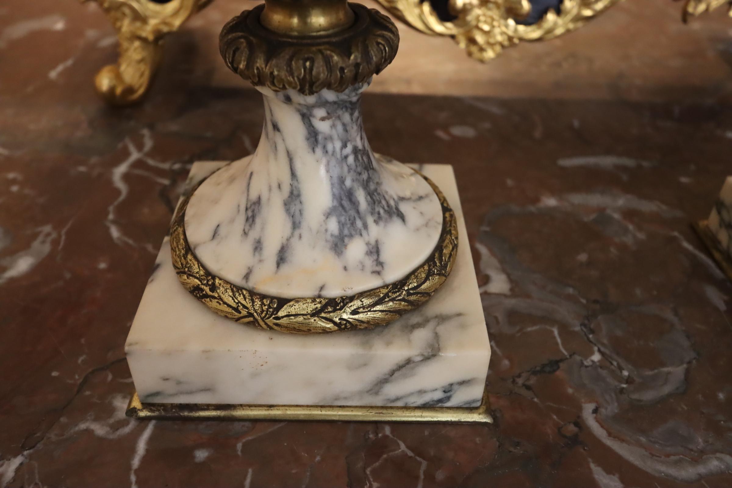 Early to mid 19th century classical marble and guilt bronze mounted urns.