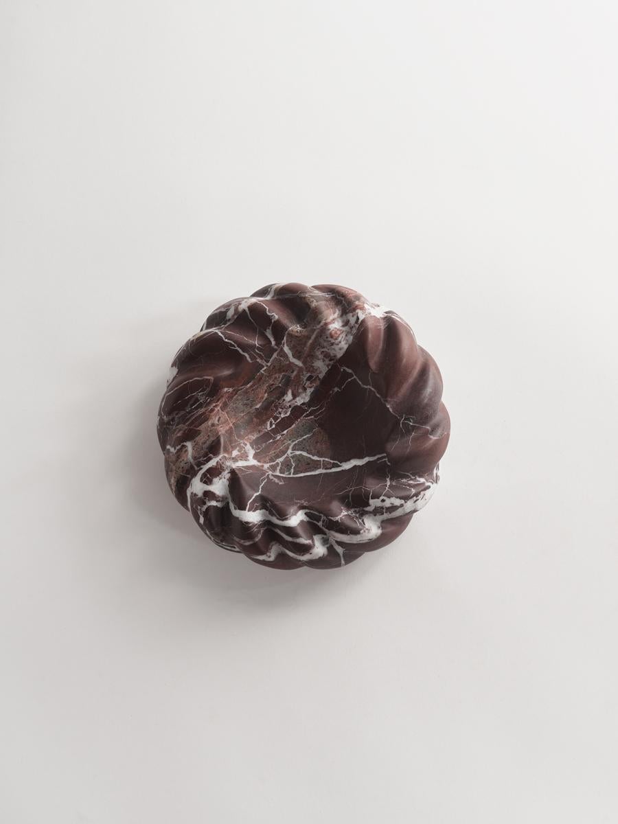 Iridescent, carved by hand and finished to Greg Natale's exacting standards, the rope bowl is a multipurpose catchall or decorative accent that you will fall in love with over-and-over again. As smooth as it is solid, this piece commands attention