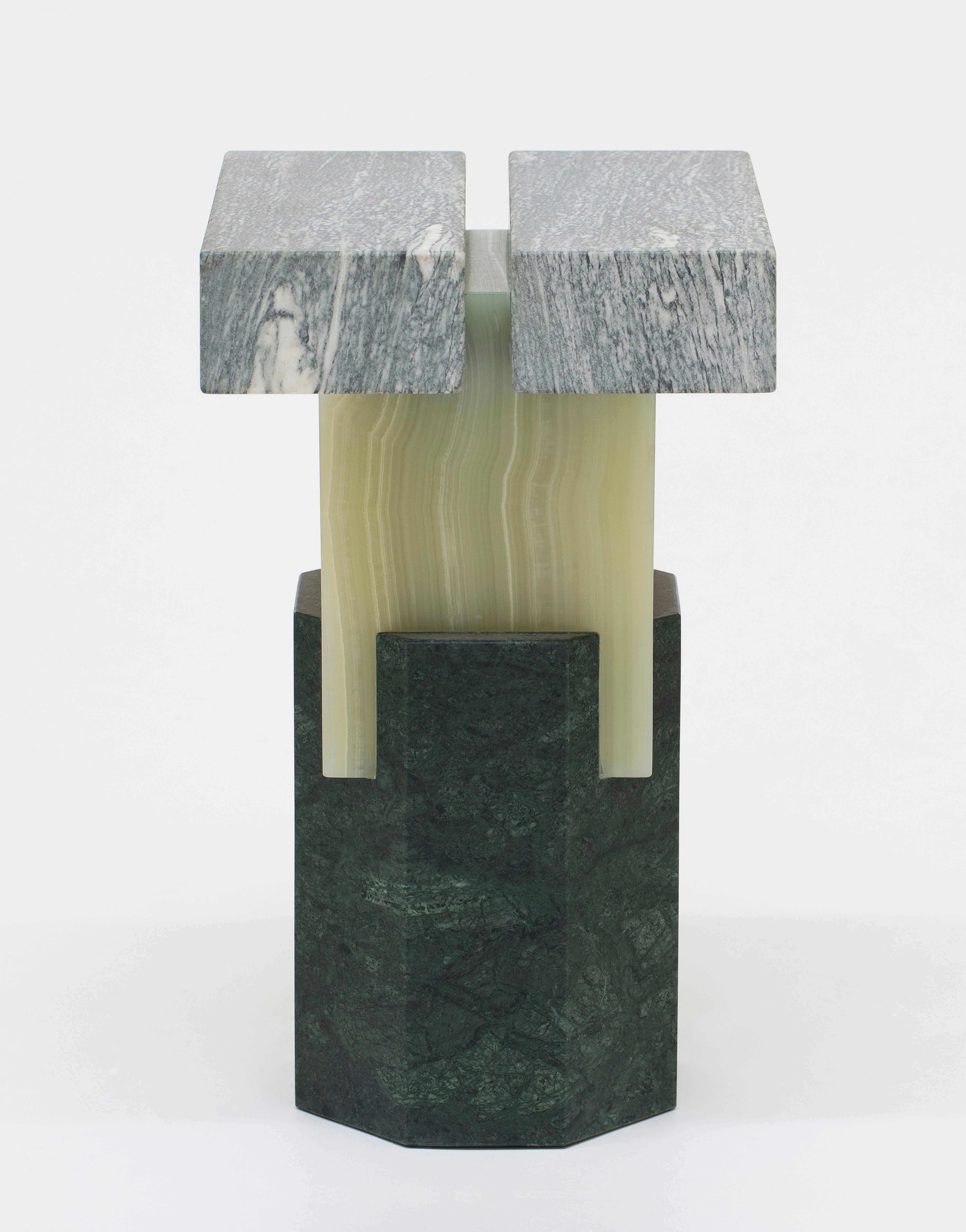 Marble Ionik Chroma stool by Oeuffice
Edition: 12 + 2AP
2014
Dimensions: 25 x 26 x 42 cm
Materials: Cipollino Apuano marble, Onice Verde onyx, Verde Guatemala marble

Kapital is a series of limited edition tables and stools based on essential