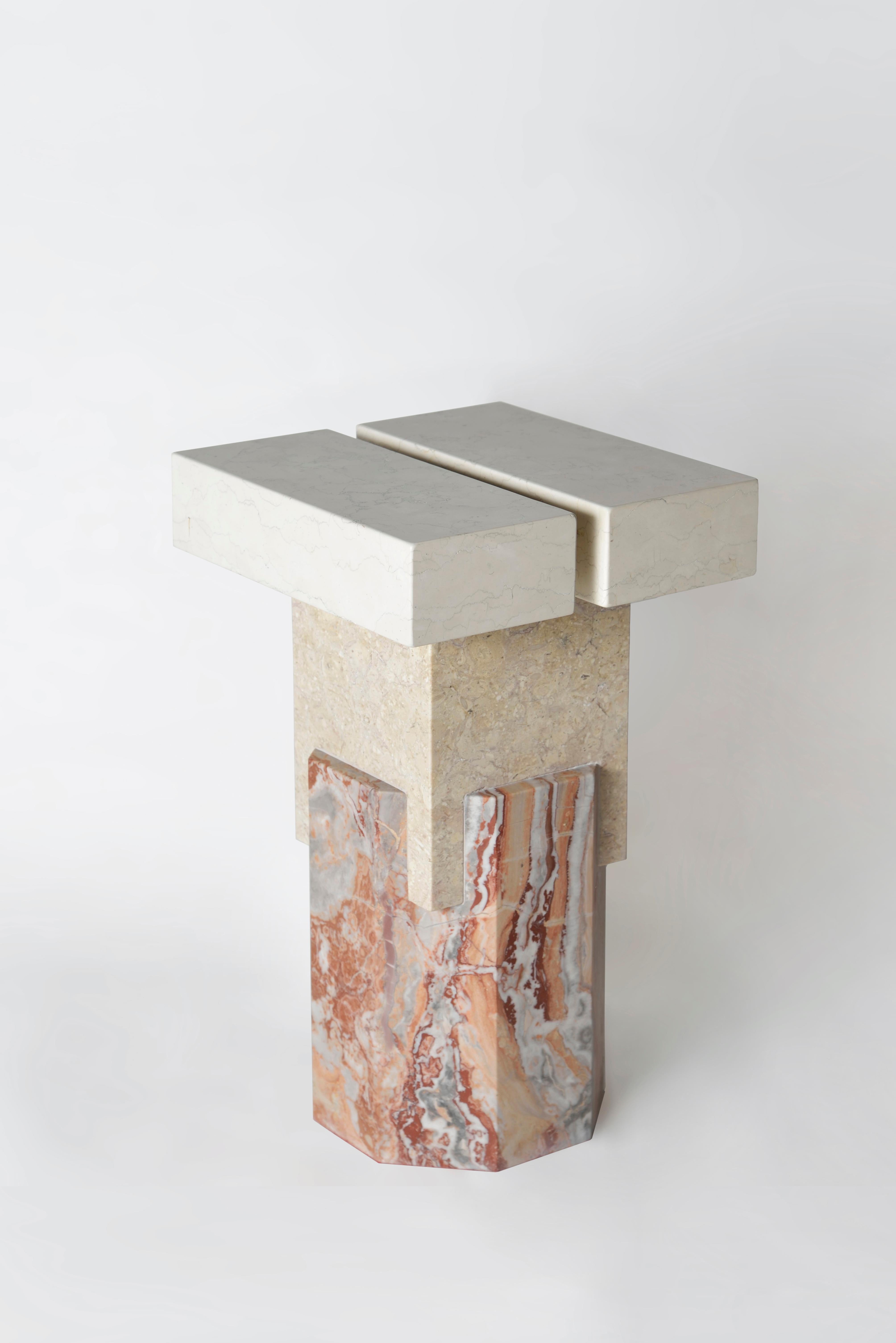 Marble Ionik stool by Oeuffice
Edition: 12 + 2AP
2014
Dimensions: 25 x 26 x 42 cm
Materials: Arabescato Robico marble, Chiampo stone, Biancone marble

Kapital is a series of limited edition tables and stools based on essential forms,