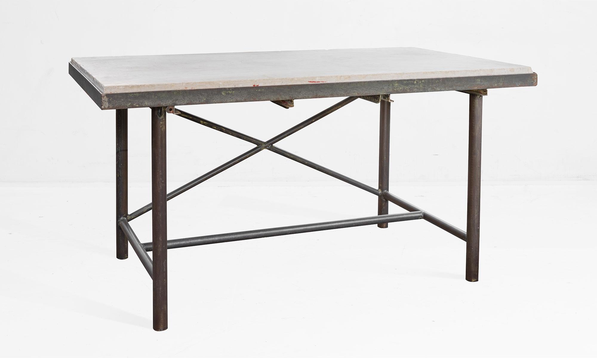 Marble laboratory table, France, circa 1920.

An incredible marble slab sits on an industrial iron base.

 
