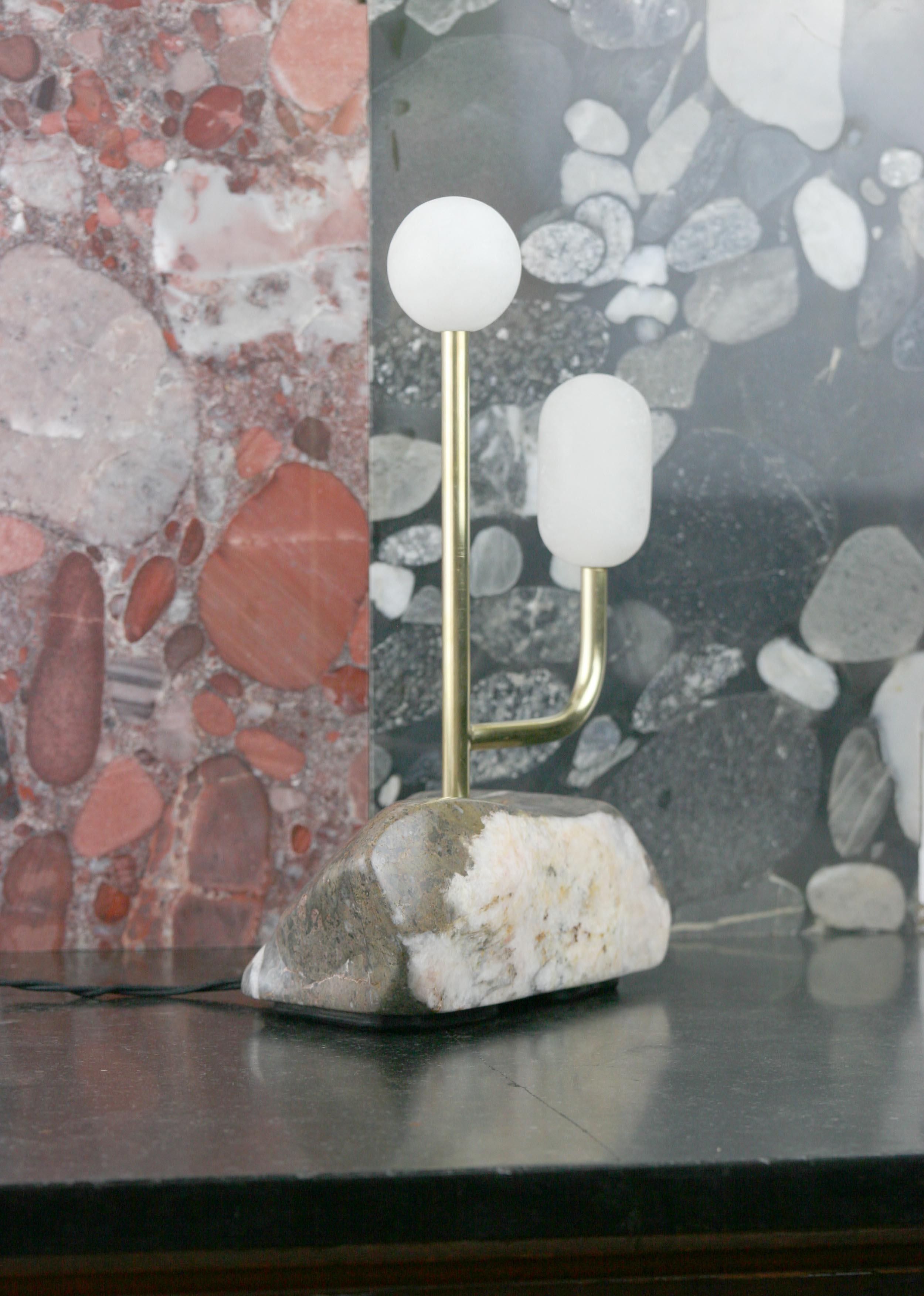 Marble lamp by Krzywda
Dimensions: 25L x 15D x 35H cm
Materials: Alabaster, marble, brass
Versions variable: Tulip, tear, oblong, sphere diffuser.

Individually handmade in France by Krzywda. Each marble base is sculpted by hand and varies from