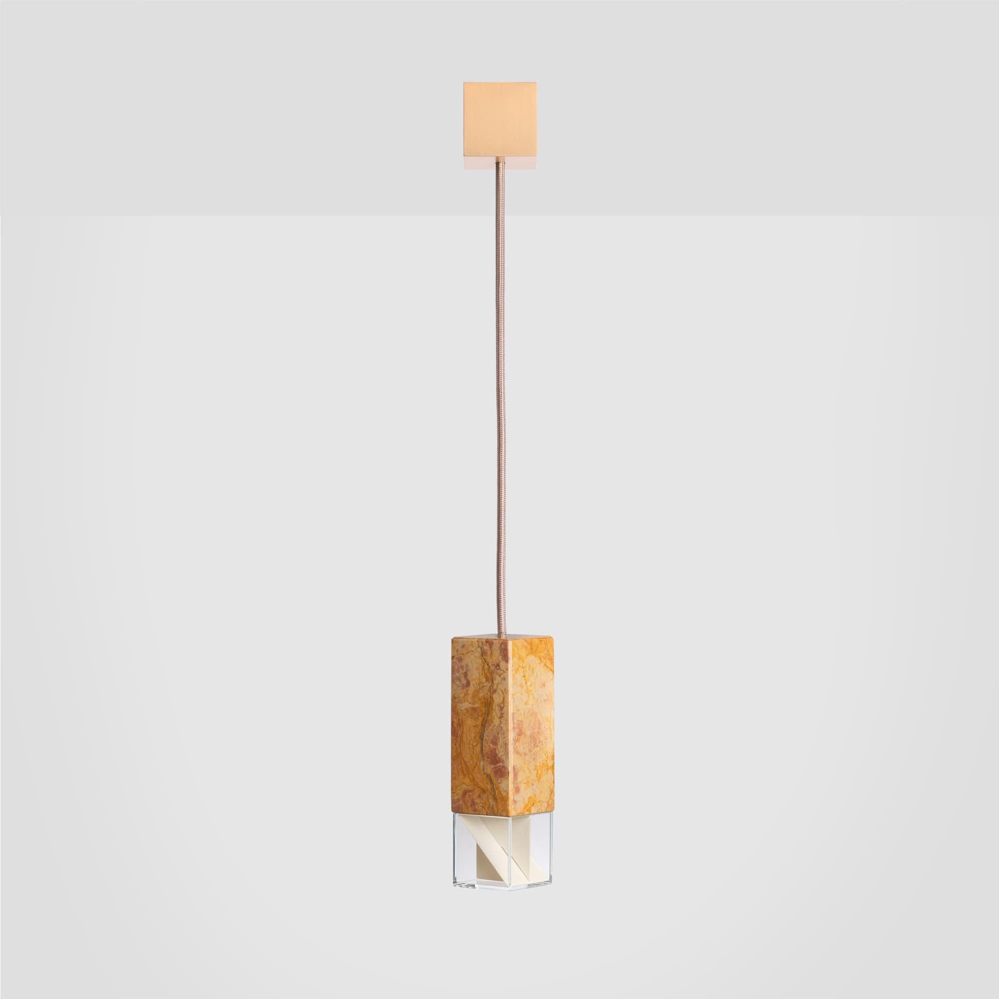 Lamp one color edition by Formaminima
Dimensions: 5 x 5 x H 17 cm
Materials: Lamp body in marble giallo reale rosato
Ultra- thin anti-reflection crystal diffuser
Inside- diffuser Limoges biscuit-finish porcelain sheets

Satin brass ceiling
