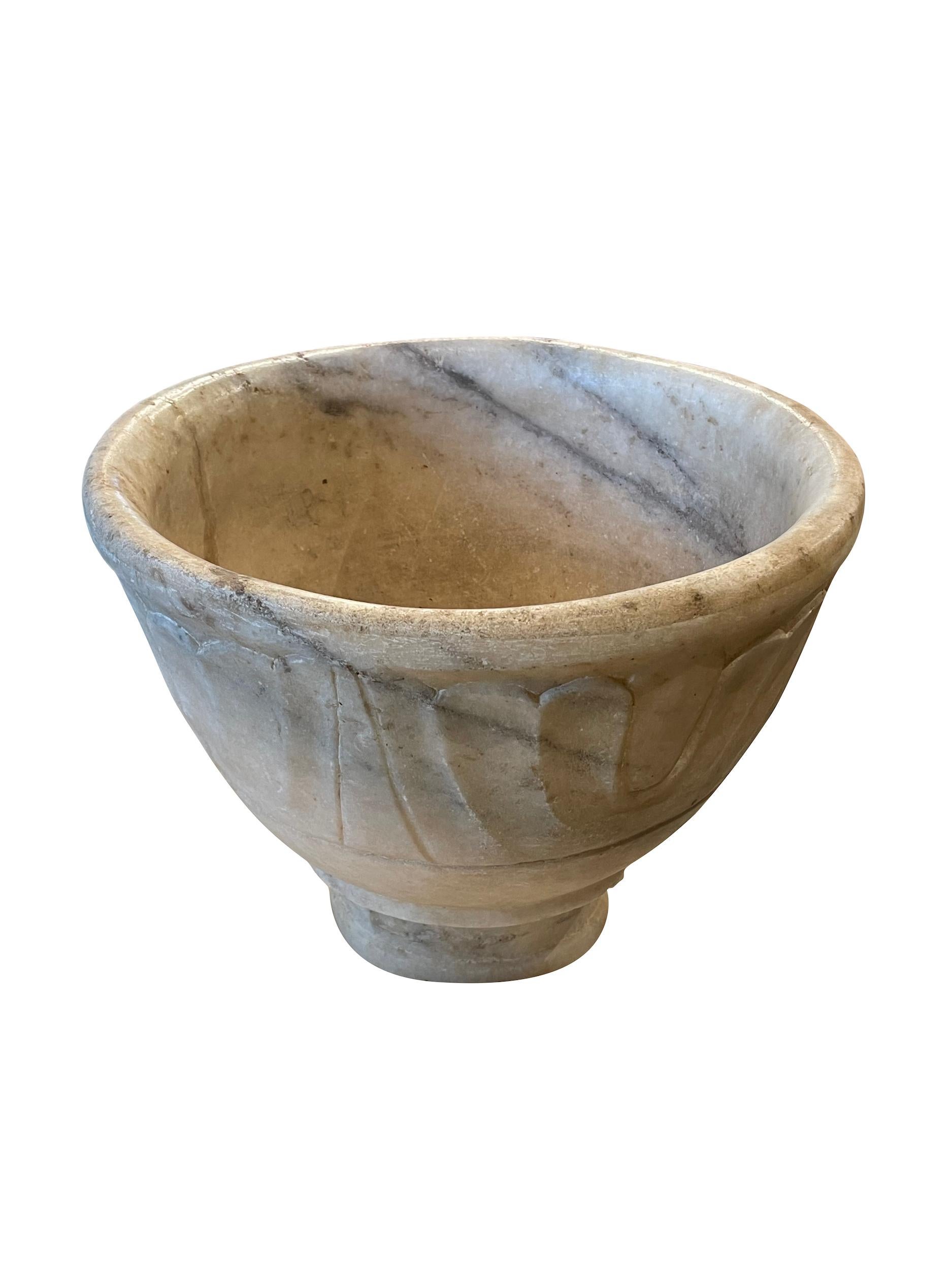19th century Indian deep large marble bowl.
Decorative raised exterior motif.
Beautiful aged patina.
Two available and sold individually.