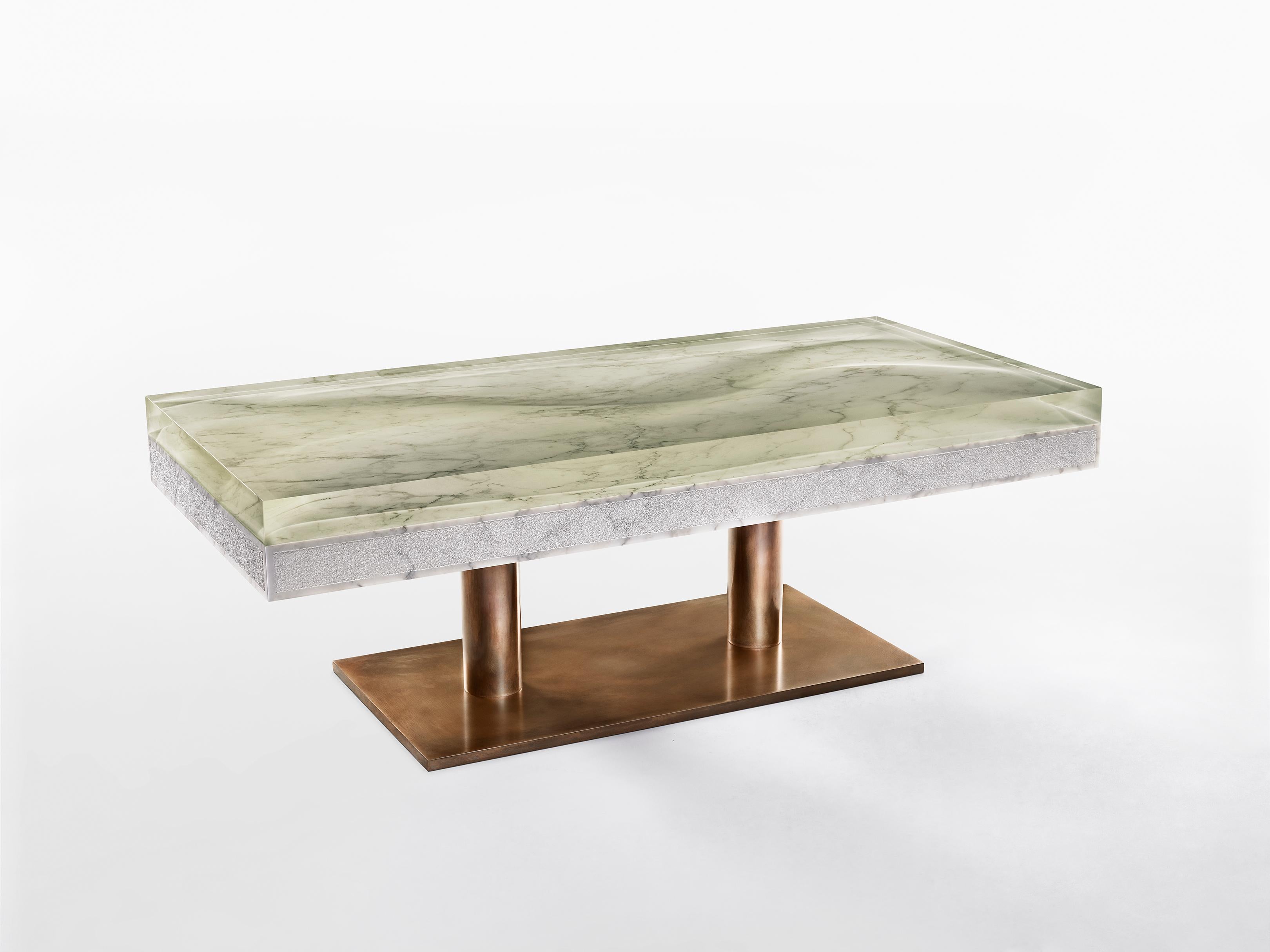 Marble low table by Jonathan Hansen
9 Editions + 1 AP
Dimensions: 116.8 x 55.9 x 40.6 cm
Materials: Calacatta Marble, Architectural Bronze, Resin


SERIES I CAPTUM BIOMORFE is a group of nine sculpture works created by New York artist Jonathan