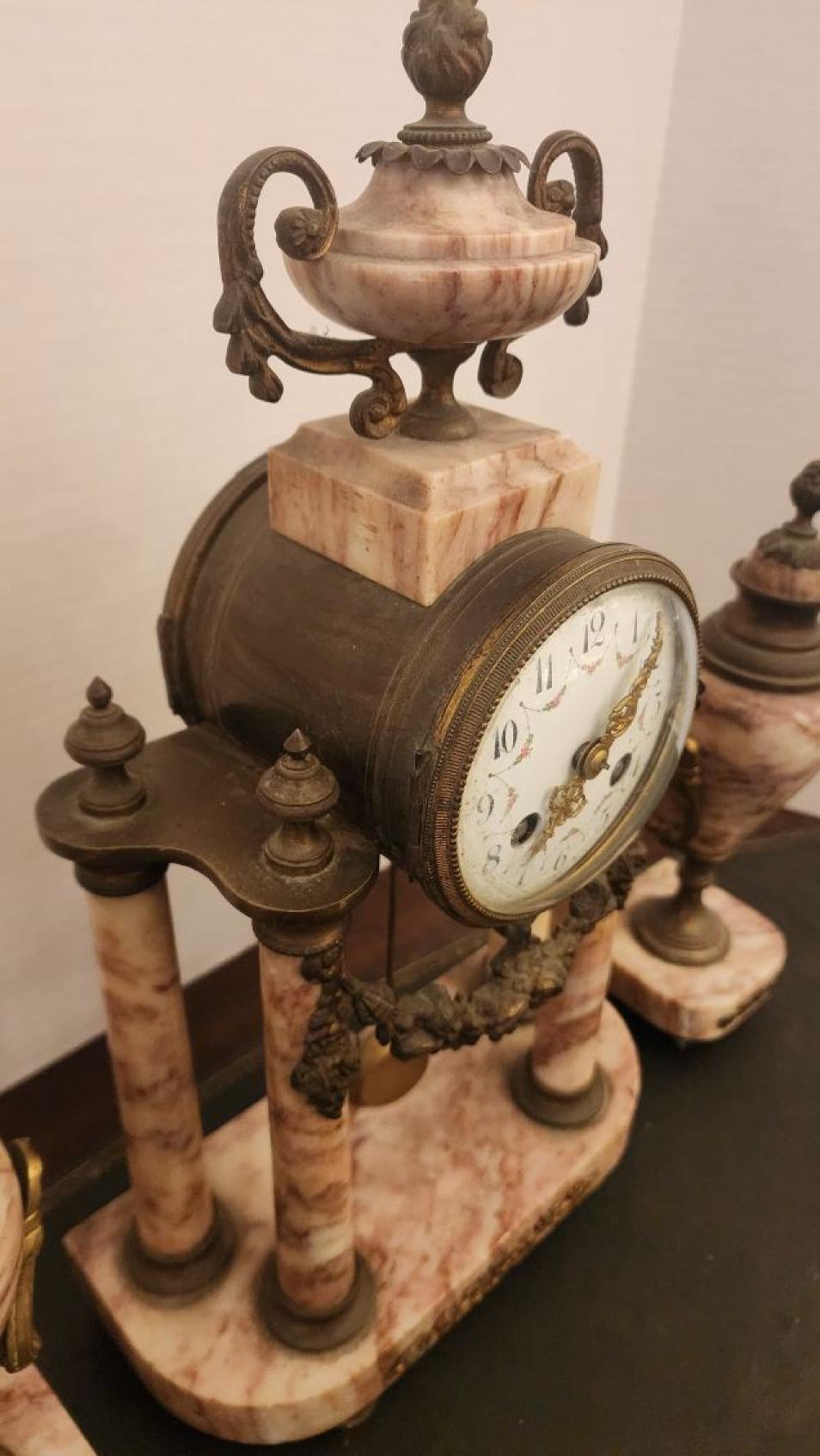 Carved Marble Mantel Clock with matching Urns For Sale