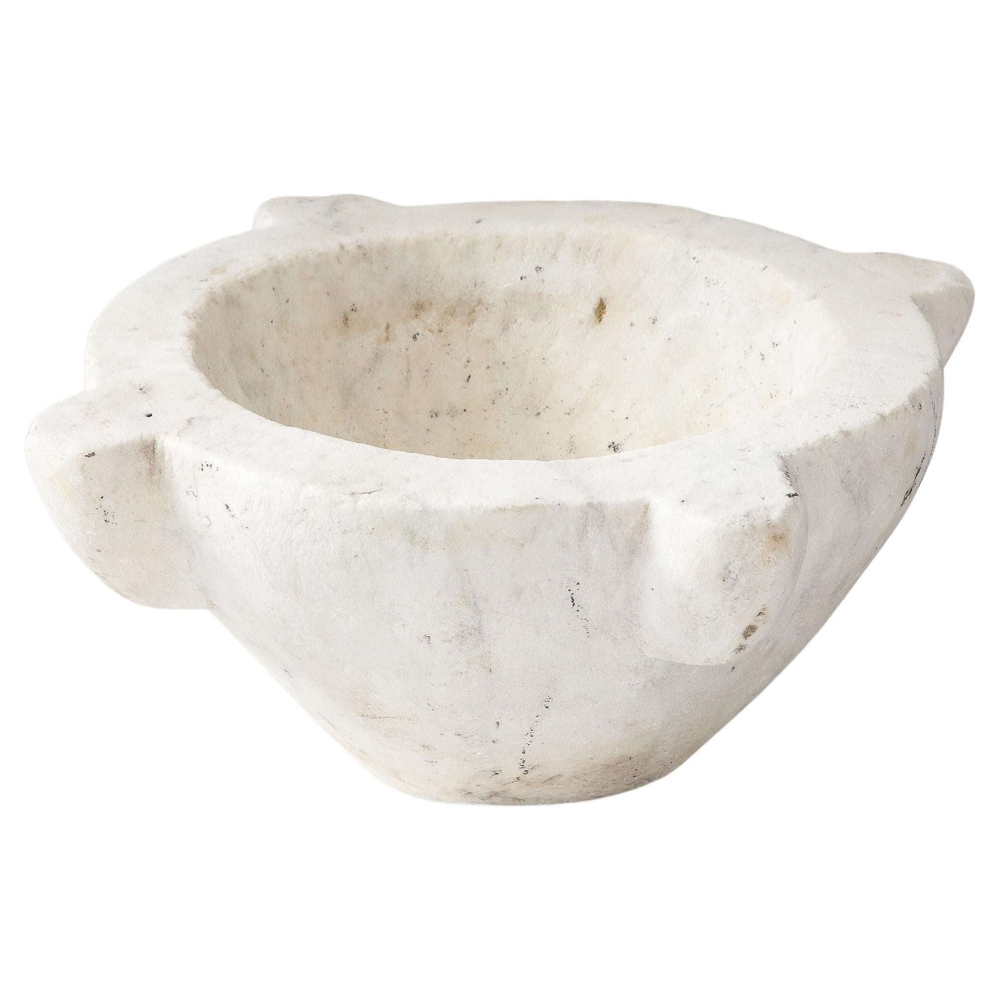 What is a marble mortar used for?
