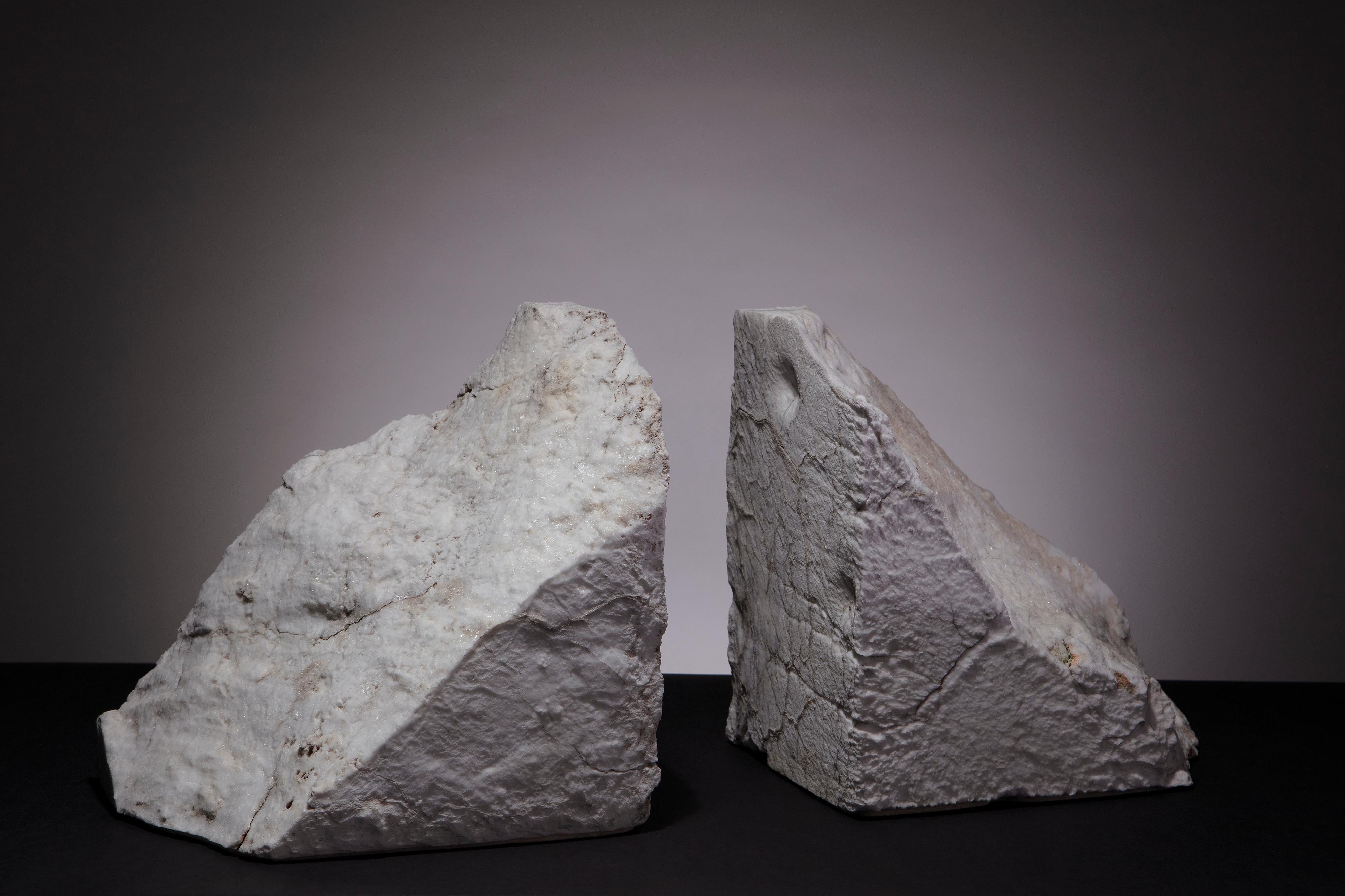Refined and rugged marble mountain bookends. 
Listing for one pair of bookends.
One of a kind.

Dimensions:
A - 7 3/4