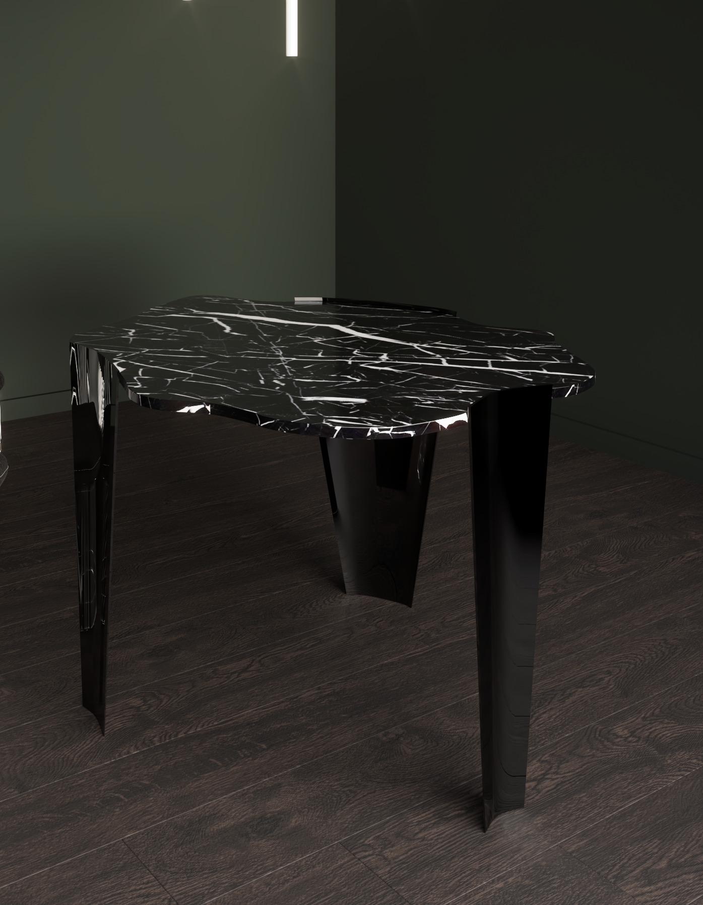 Marble nube table handsculpted by ELEMENT&CO
Dimensions: 77 x 120 x 120 cm
Materials: Black marble tabletop with metal lacquered feet

Carved from one solid marble piece, the sensual curves of the table-top and straight lines of the three legs