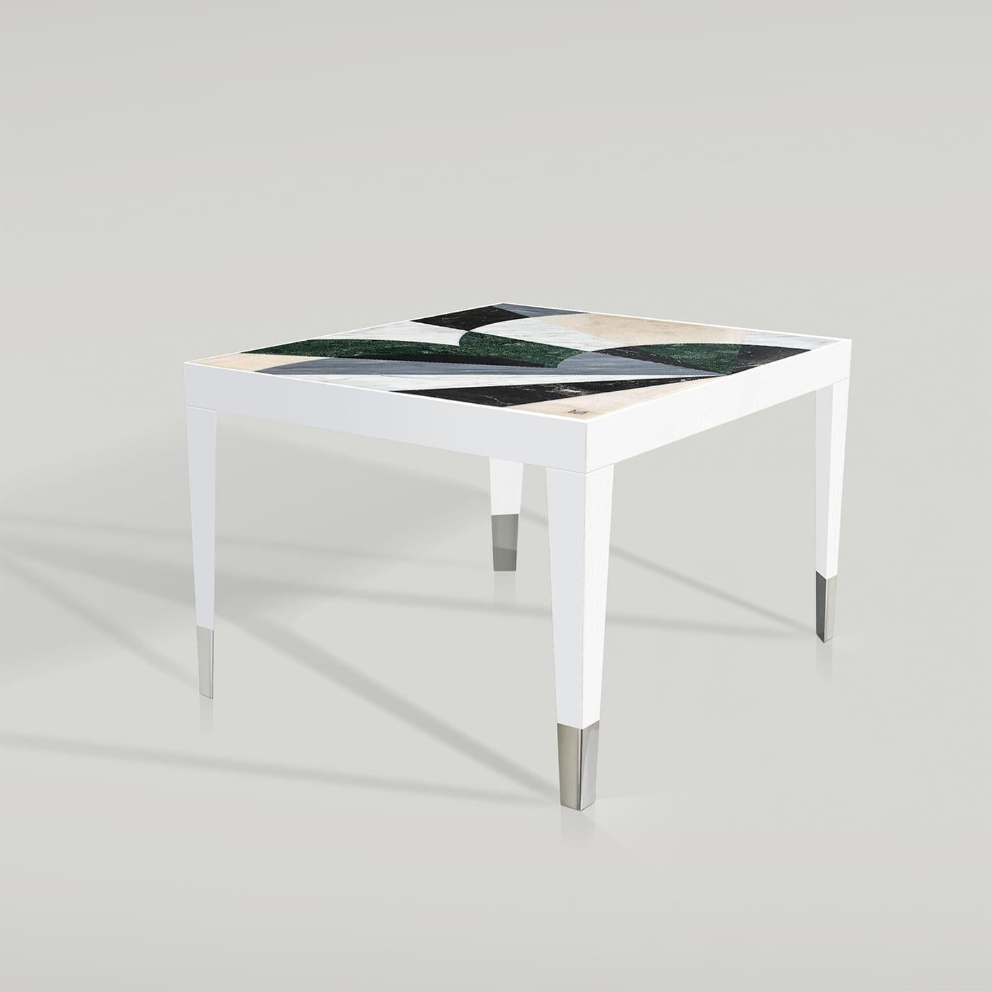 A gorgeous tribute to Turin and its characteristic clouds, this Nubi (Clouds) small coffee table features a stunning abstract geometric design created with marble inlays. Showcasing a glossy white finish wood table frame and polished steel feet, it
