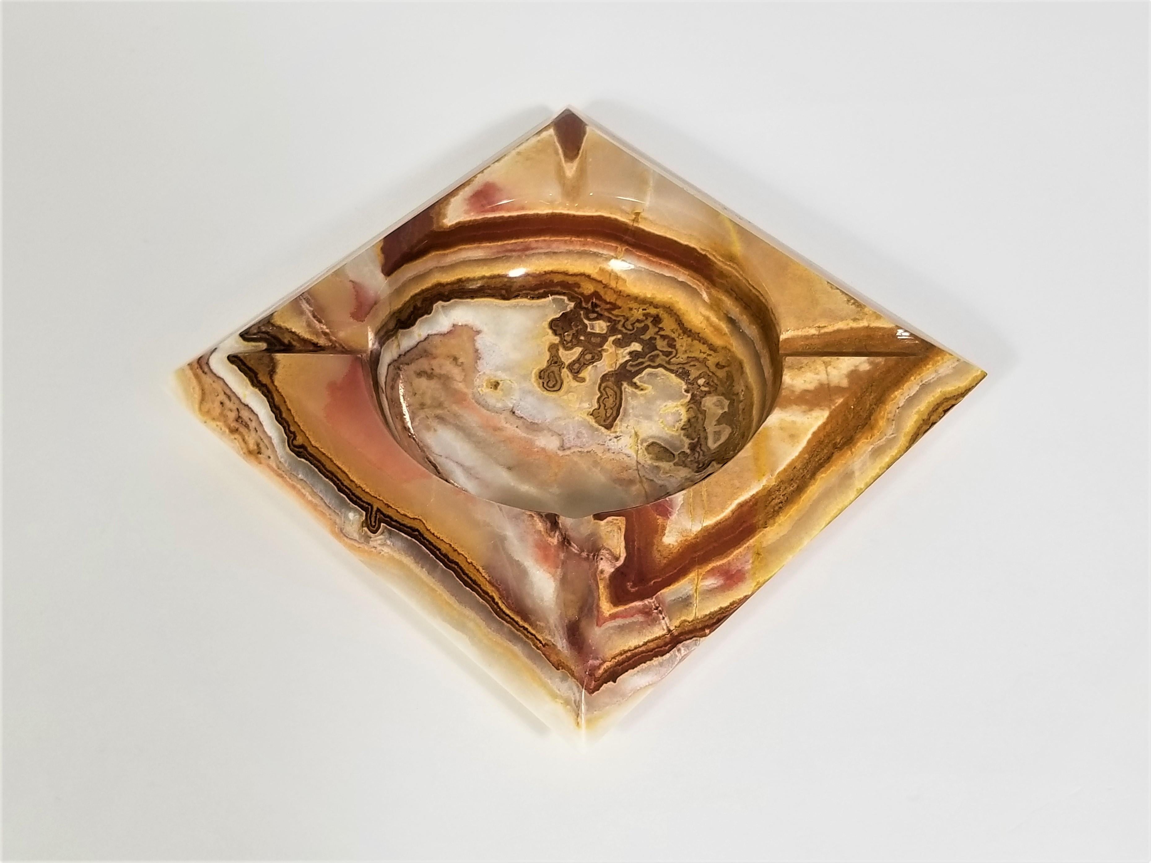 Midcentury marble onyx ashtray. Felt bottom. Excellent condition.