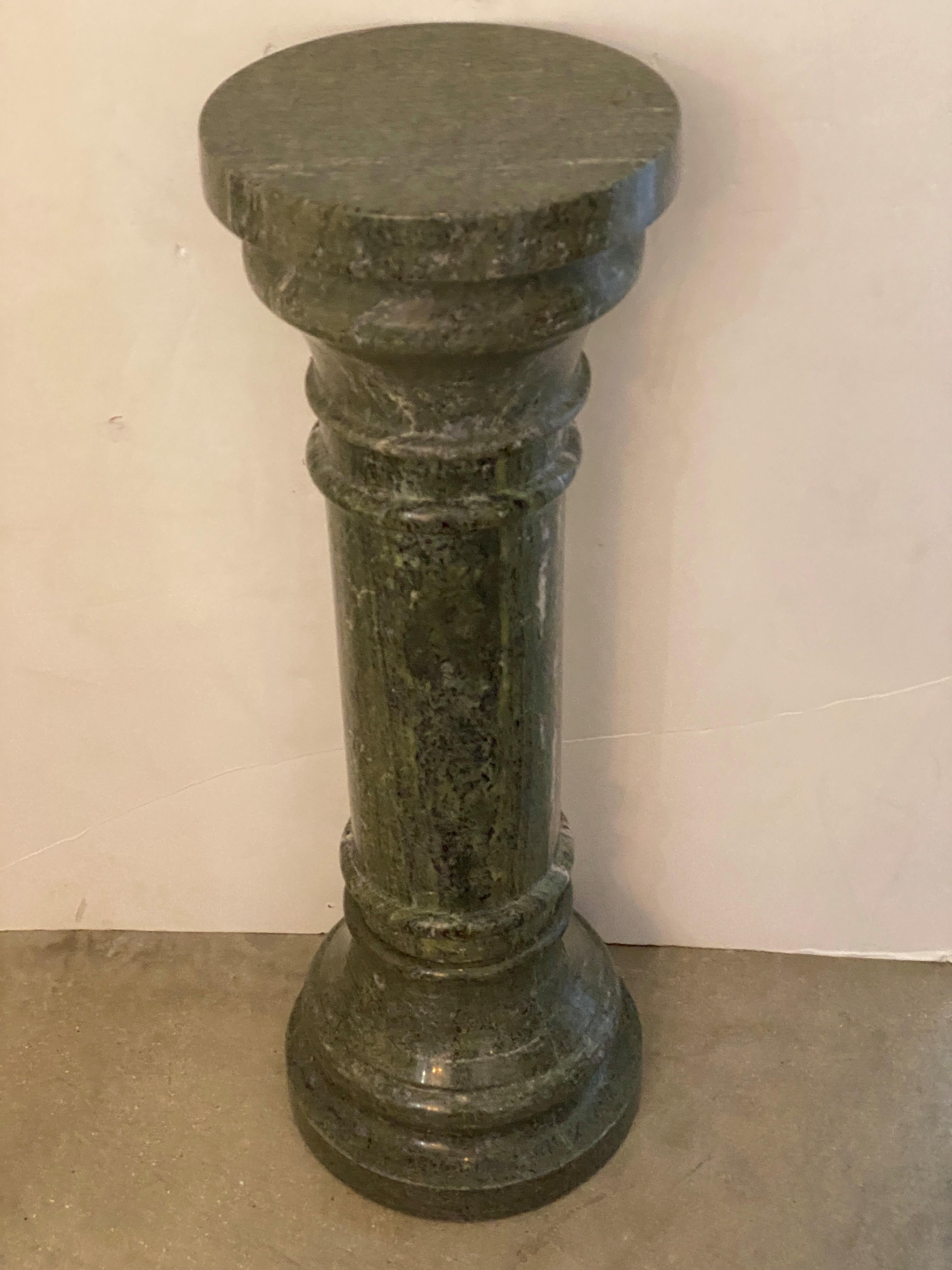 This stylish and substantial green marble Italian pedestal could be used indoors or outdoors to hold a sculpture, object of art, or perhaps a sundial.

Note: Piece is made in three sections. Base, Capital, Column.