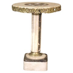 Mesa con pedestal de mármol