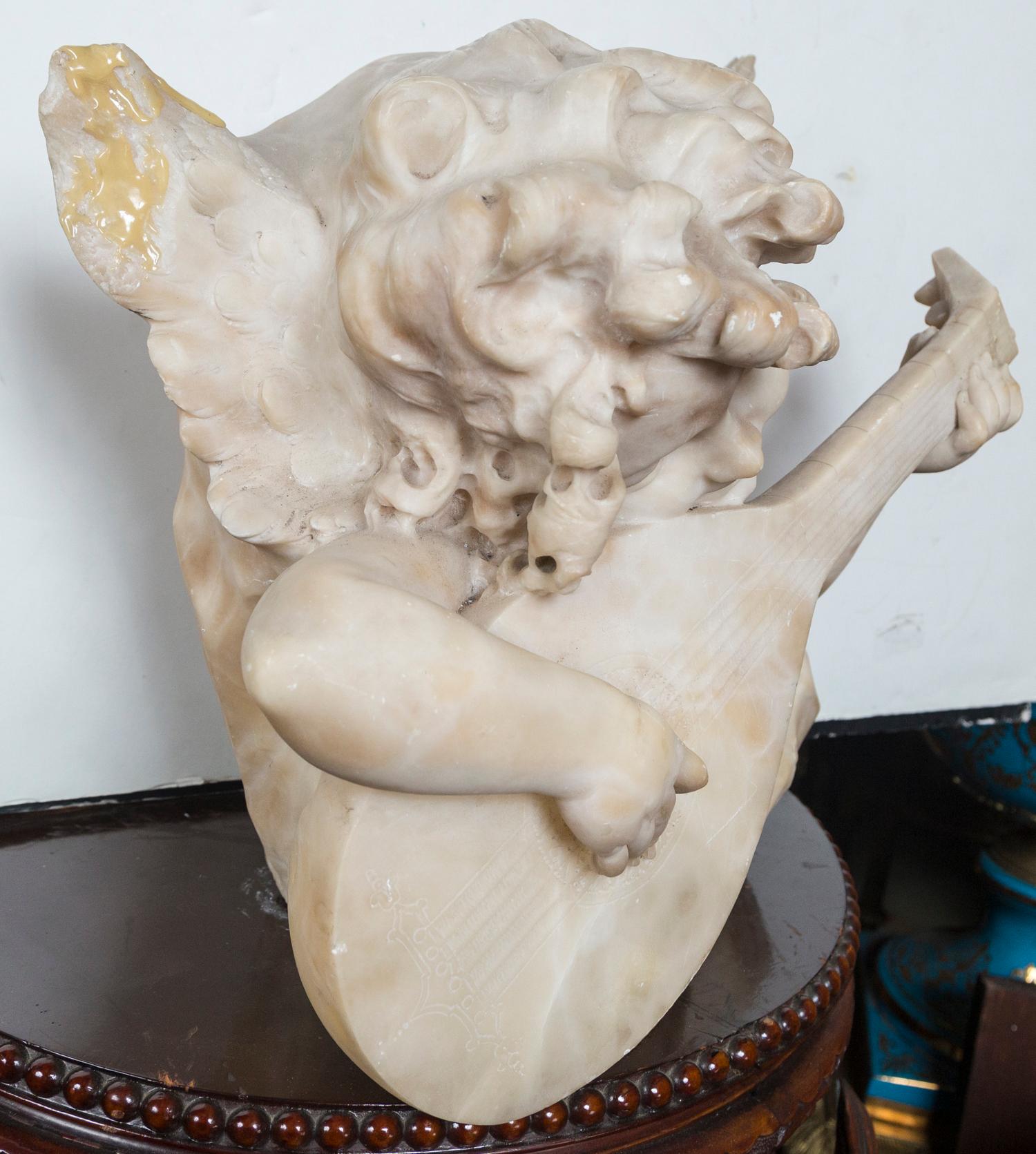Hand-Carved Marble Putto Playing a Mandolin For Sale