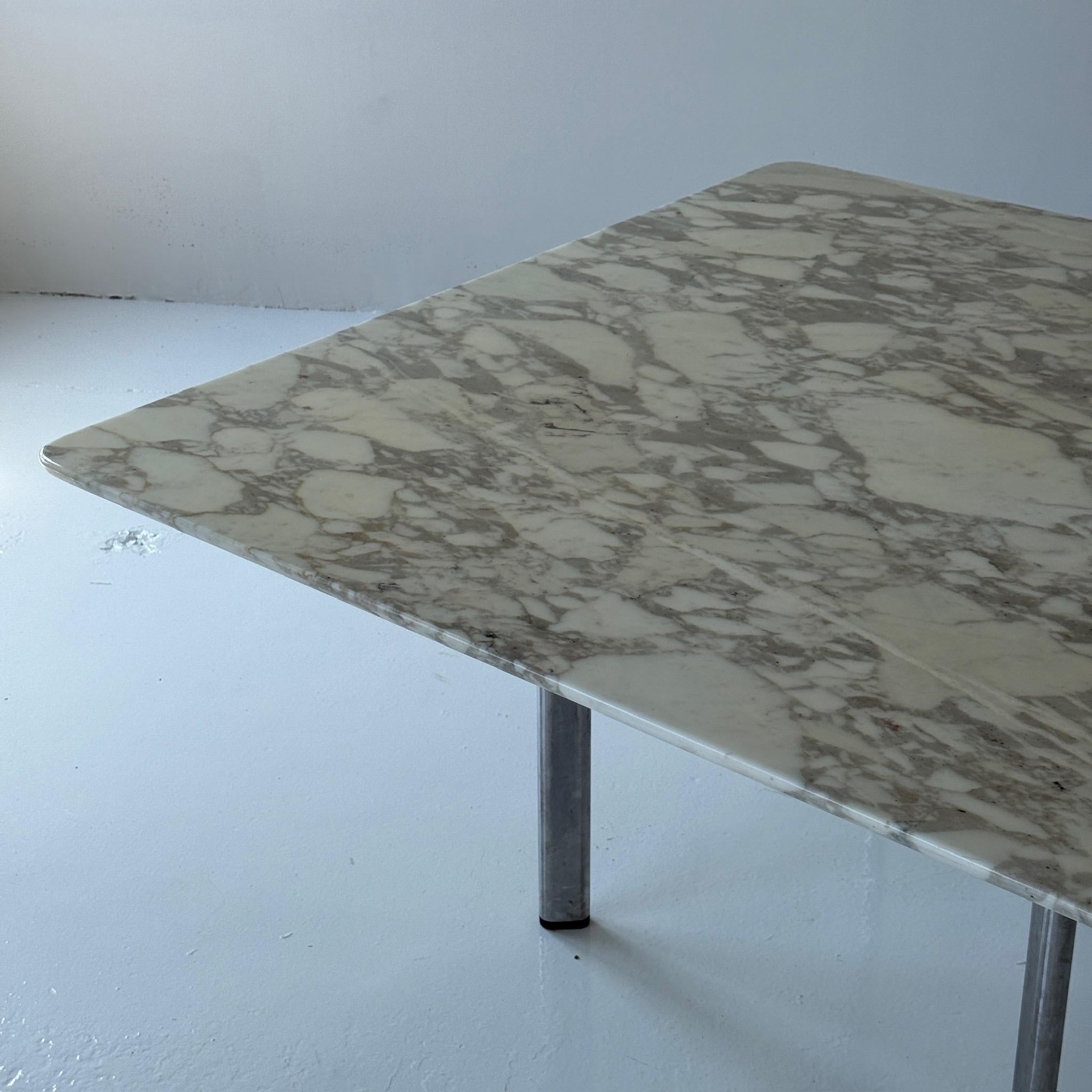 c. 1980. USA. Marble top square dining table with chrome base. Signed. 

