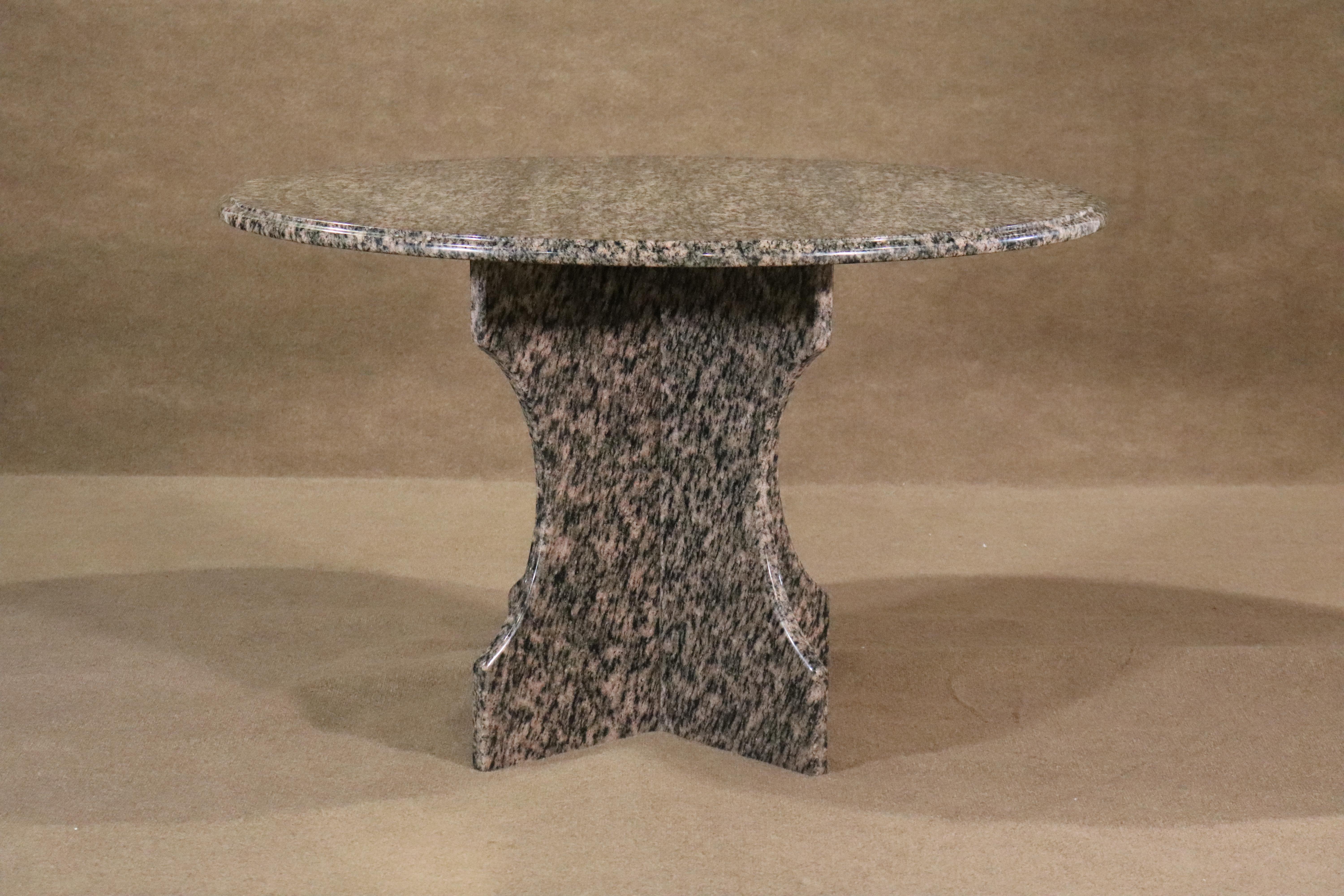 Simply designed polished marble dining table set on an X frame stone base.
Please confirm location NY or NJ