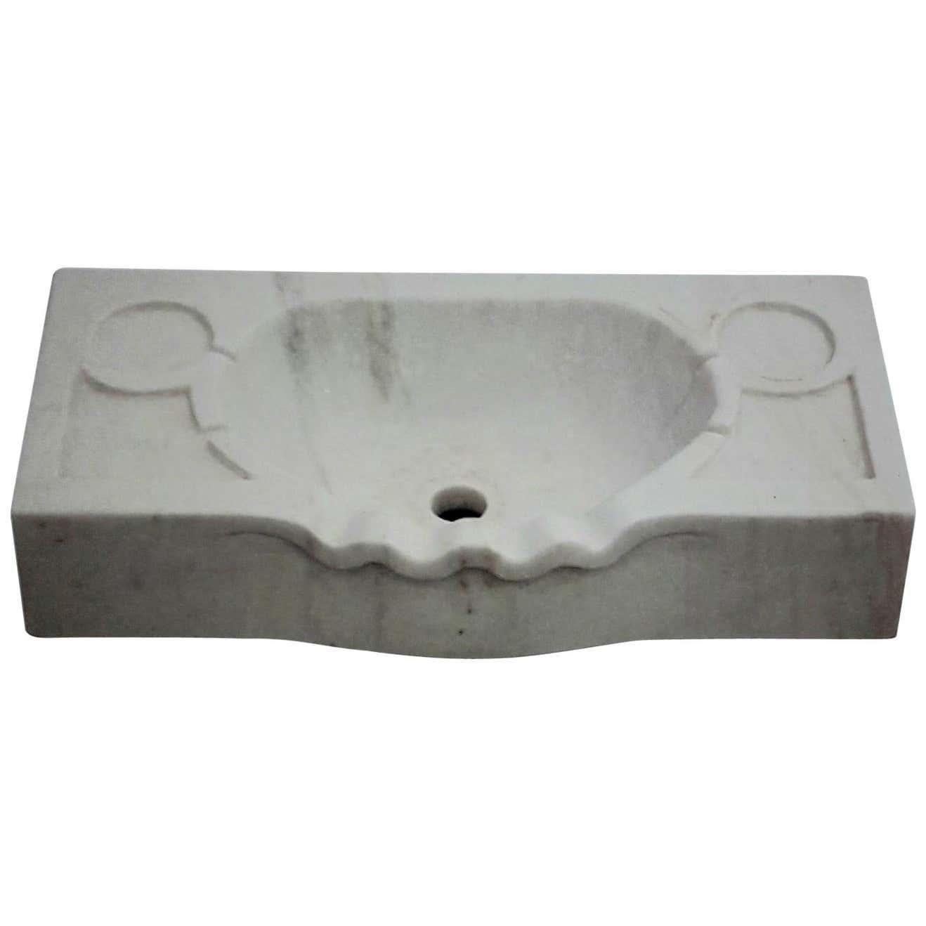 scalloped marble sink
