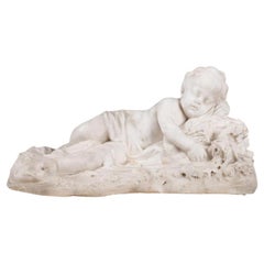 Sculpture en marbre « Cupidon couché sur un lit de fleurs » signée et datée 