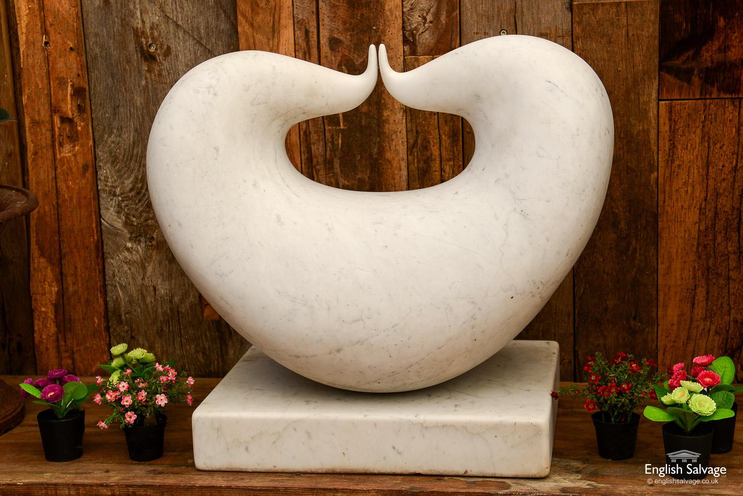 Kiss II, a Carrara marble sculpture by Mel Fraser, a contemporary Scottish female artist.