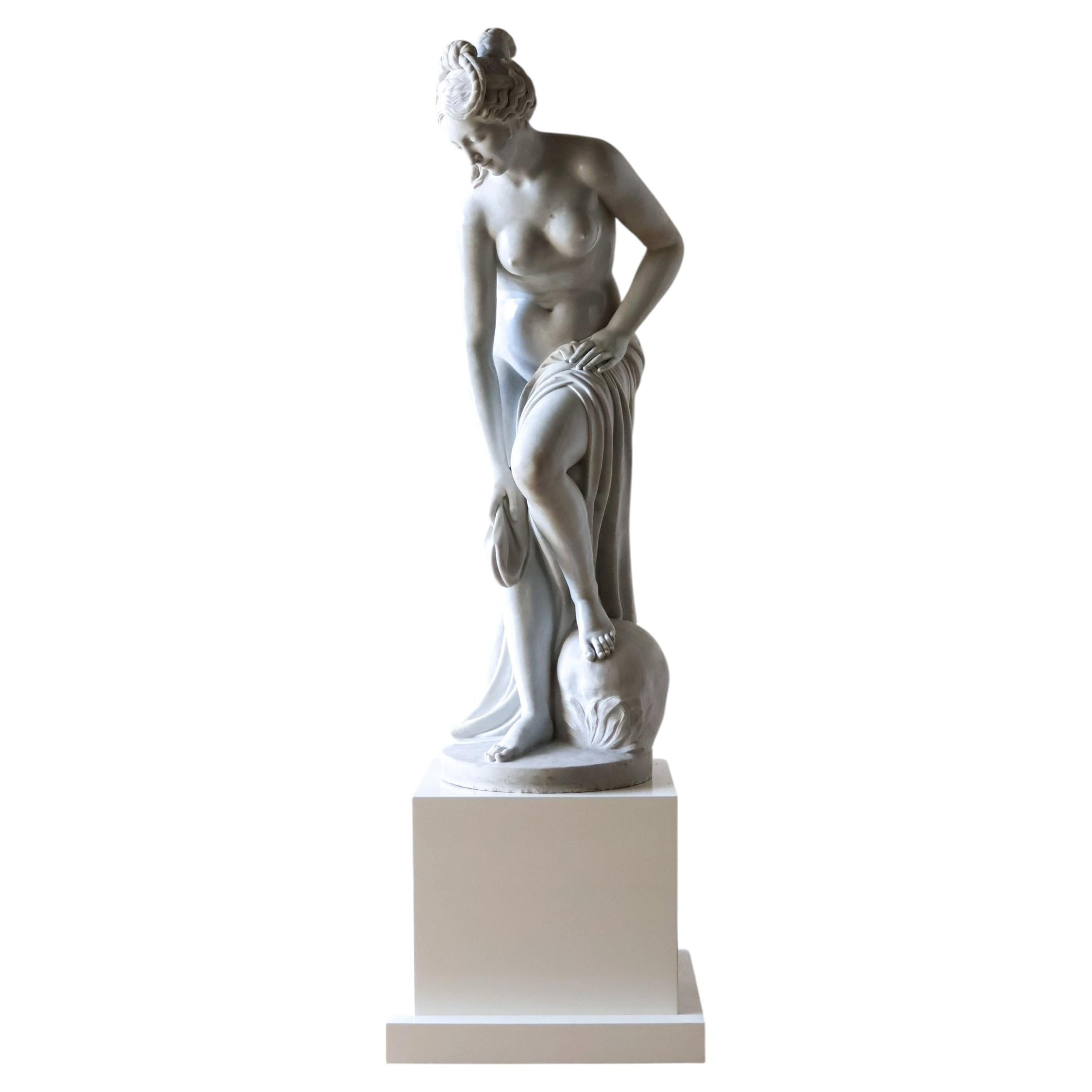 Marble sculpture of a bathing woman after Christophe-Gabriel Allegrain, ca 1920