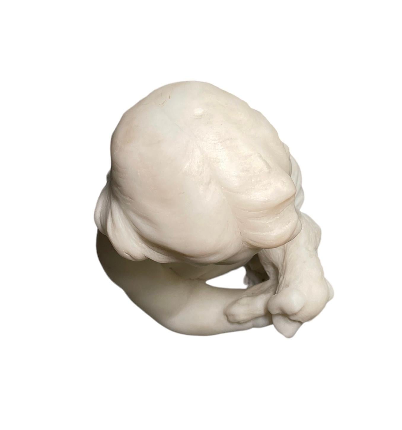 20th Century Marble Sculpture Of Cherub Holding A Puppy  For Sale