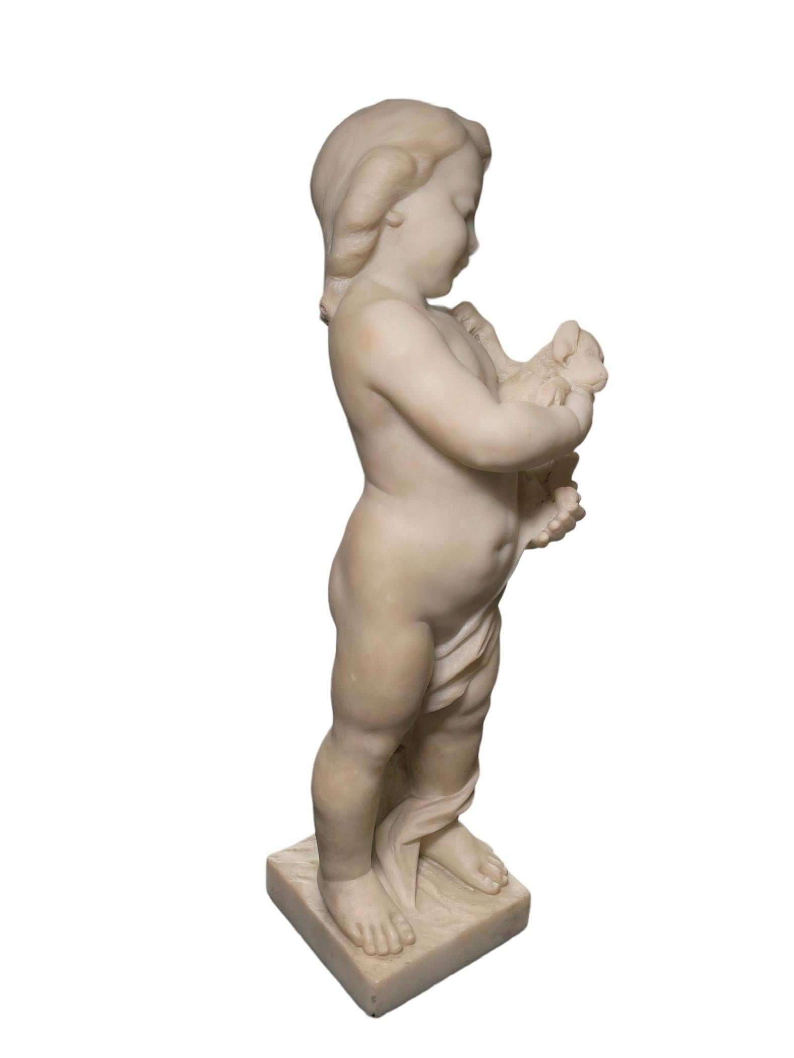 Marble Sculpture Of Cherub Holding A Puppy  For Sale 1