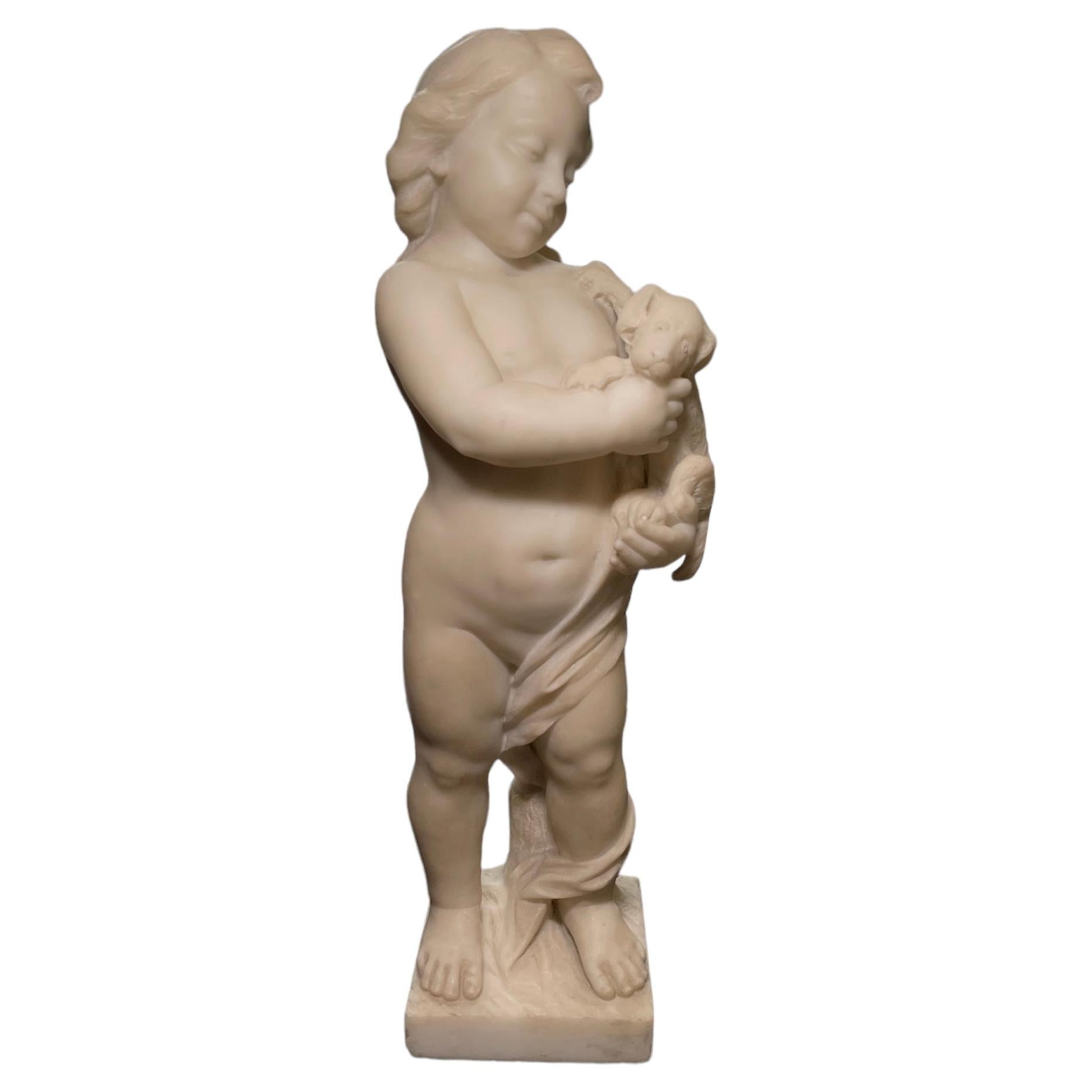 Marble Sculpture Of Cherub Holding A Puppy  For Sale