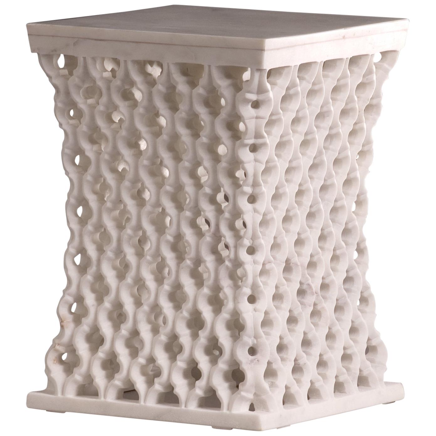 Marble side table by Paul Mathieu for Stephanie Odegard is inspired by the elegant pierced marble “Jali” screens and windows he saw in the palaces of Mughal India. This marble side table is a true piece of art and is handmade and hand carved in