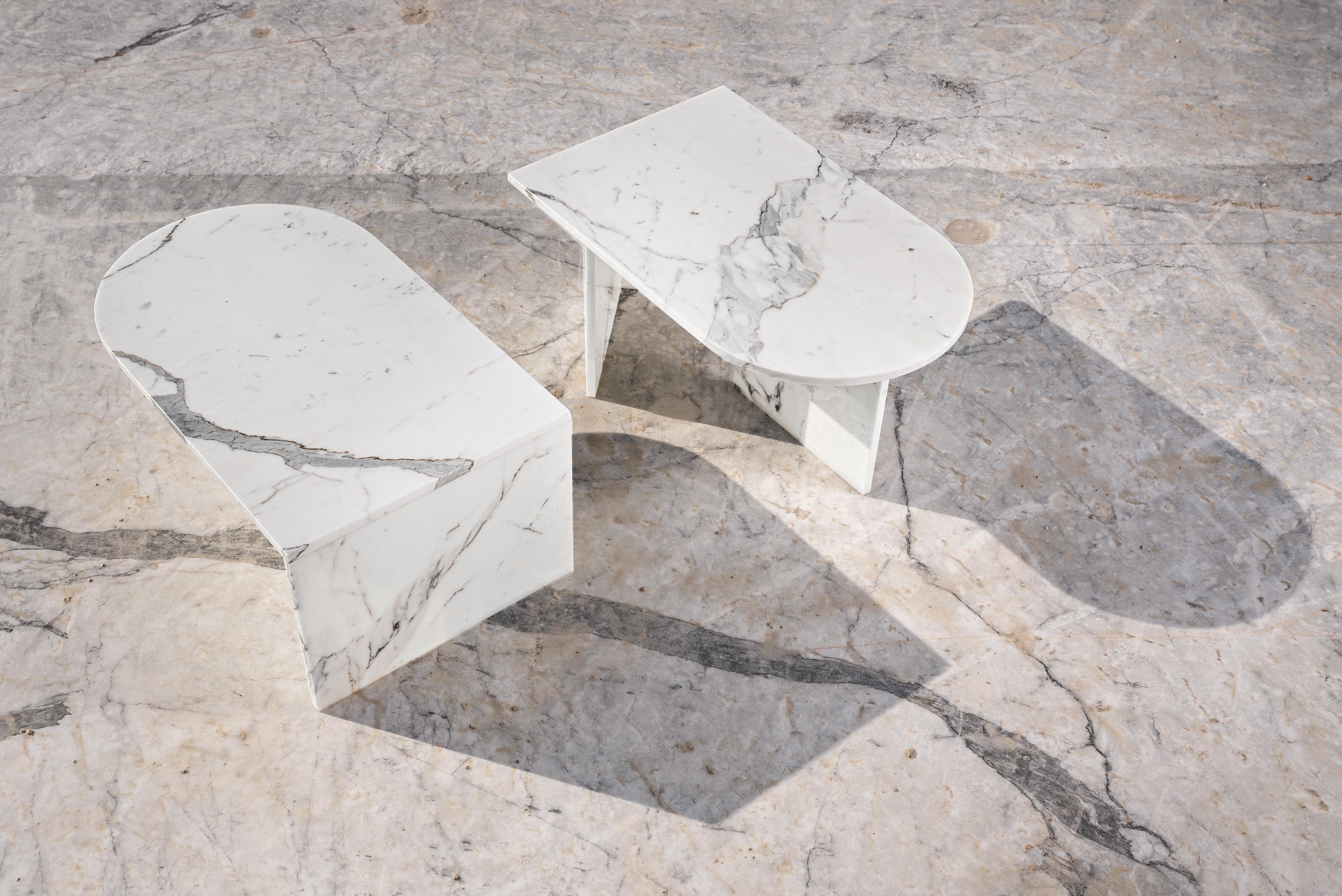 Marble side table set by Edition Club.
Dimensions: L 90 x W 55 x H 40 cm.
Materials: Arabascato marble direct from the hills of Carrara, Italy.

Edition/Club is born from an environmental consciouness of reducing waste generated from the stone