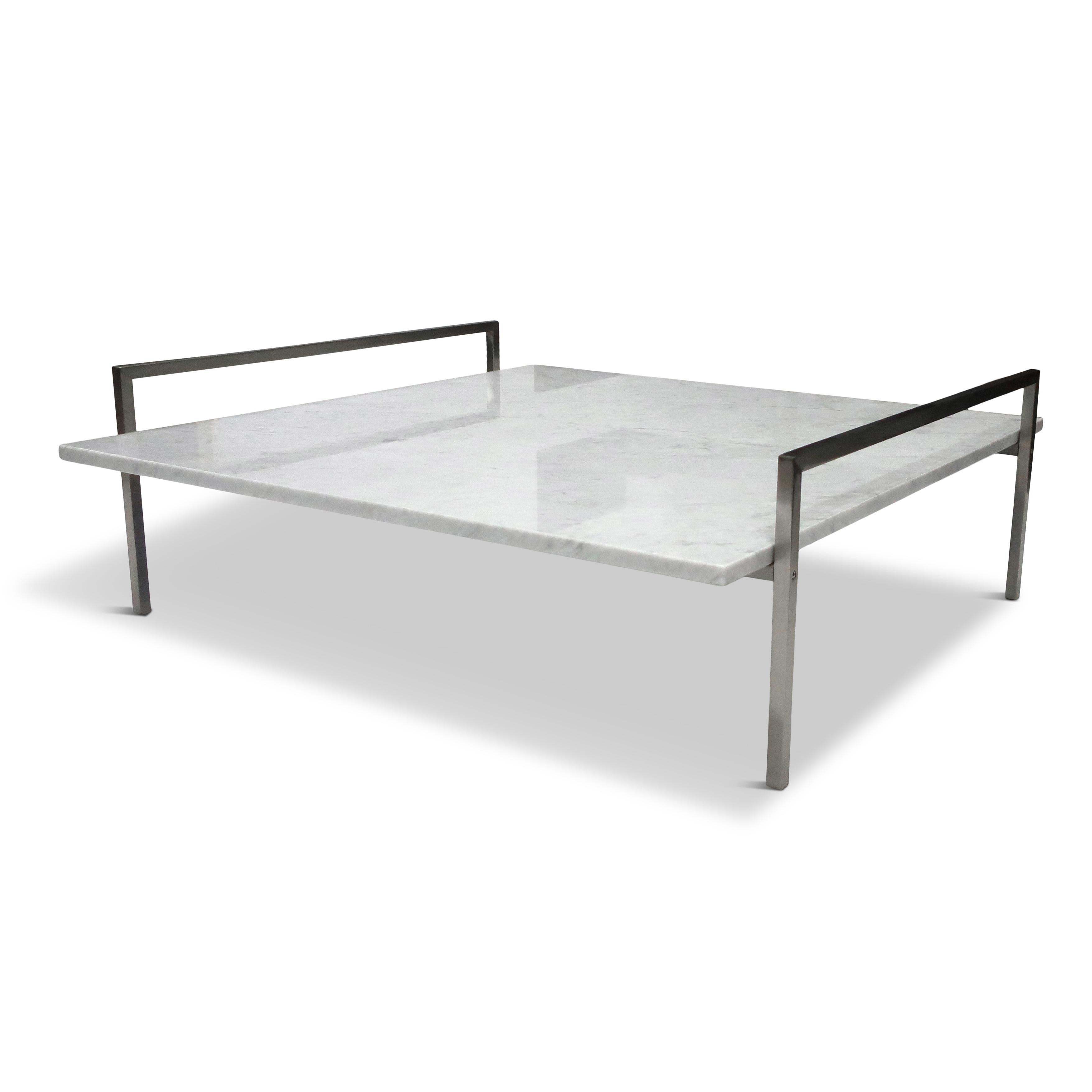 A sleek and sophisticated coffee table designed by Prospero Rasulo for Zanotta and made in Italy. Cleverly named the Skinny table it has a slim nickel-plated steel frame with a beautiful and richly veined square Carrara marble table top. 

Rasulo