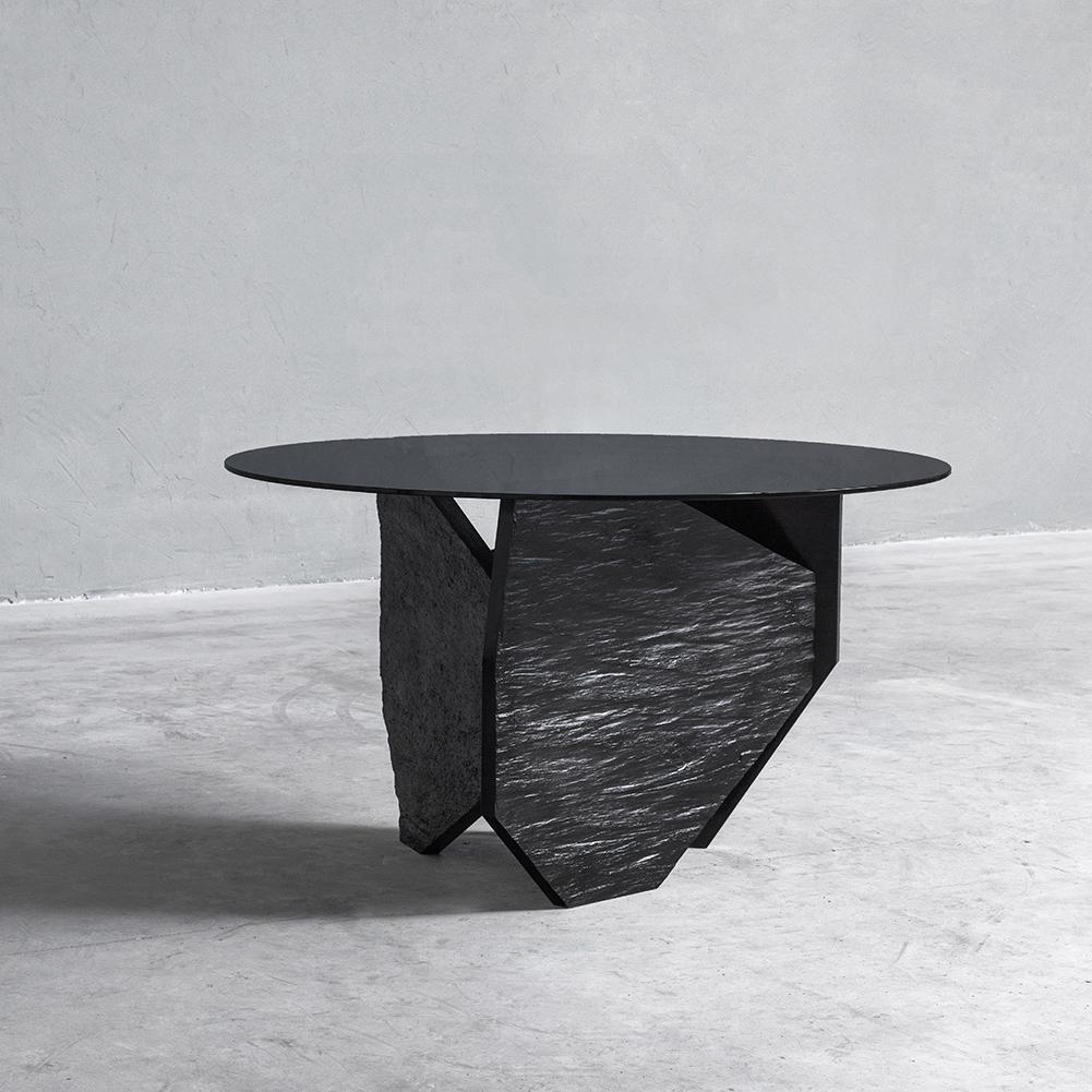 Marble slate dining table Signed by Frederic Saulou.
Limited edition : 3 / 8.
Designer: Frederic Saulou.
Title: Fragmenté.
Materials: Black Slate, grey smocked mirror.
Dimensions: 75 x 130 x 130 cm
Edition of eight.
Signed and numbered.

