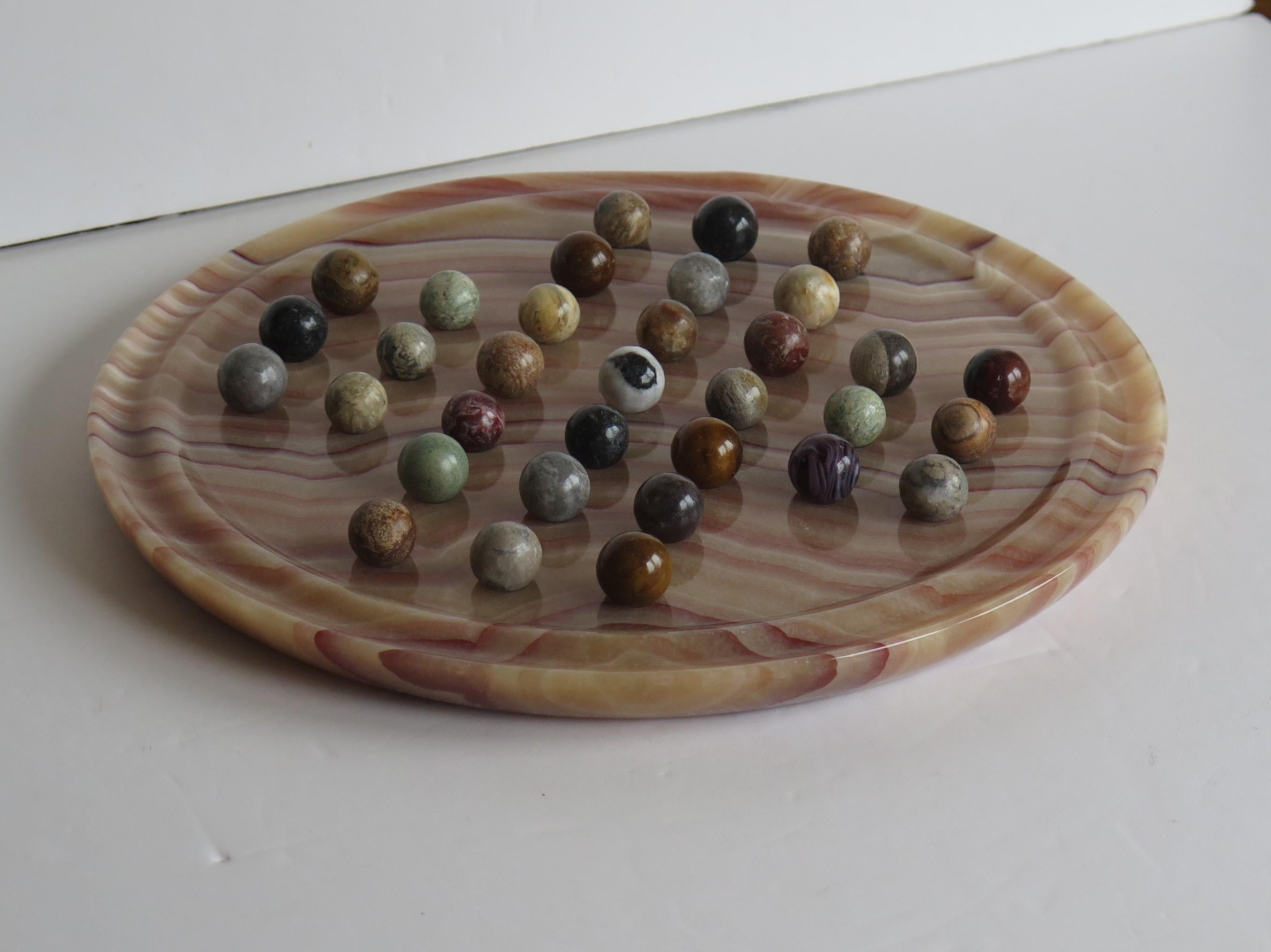 Folk Art Marble Solitaire Board Game Natural Stone Board & 33 Agate Marbles, circa 1950