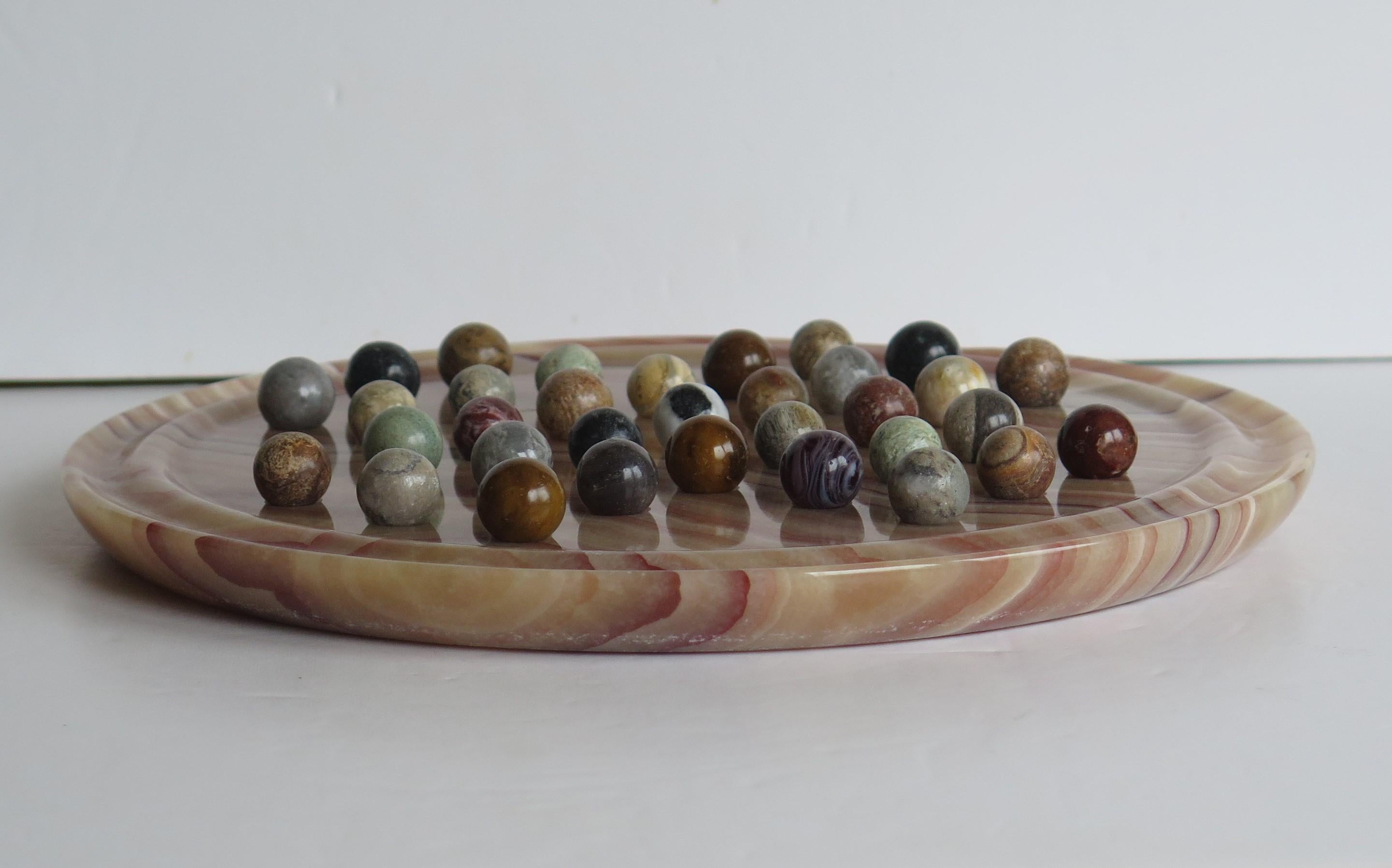 French Marble Solitaire Board Game Natural Stone Board & 33 Agate Marbles, circa 1950
