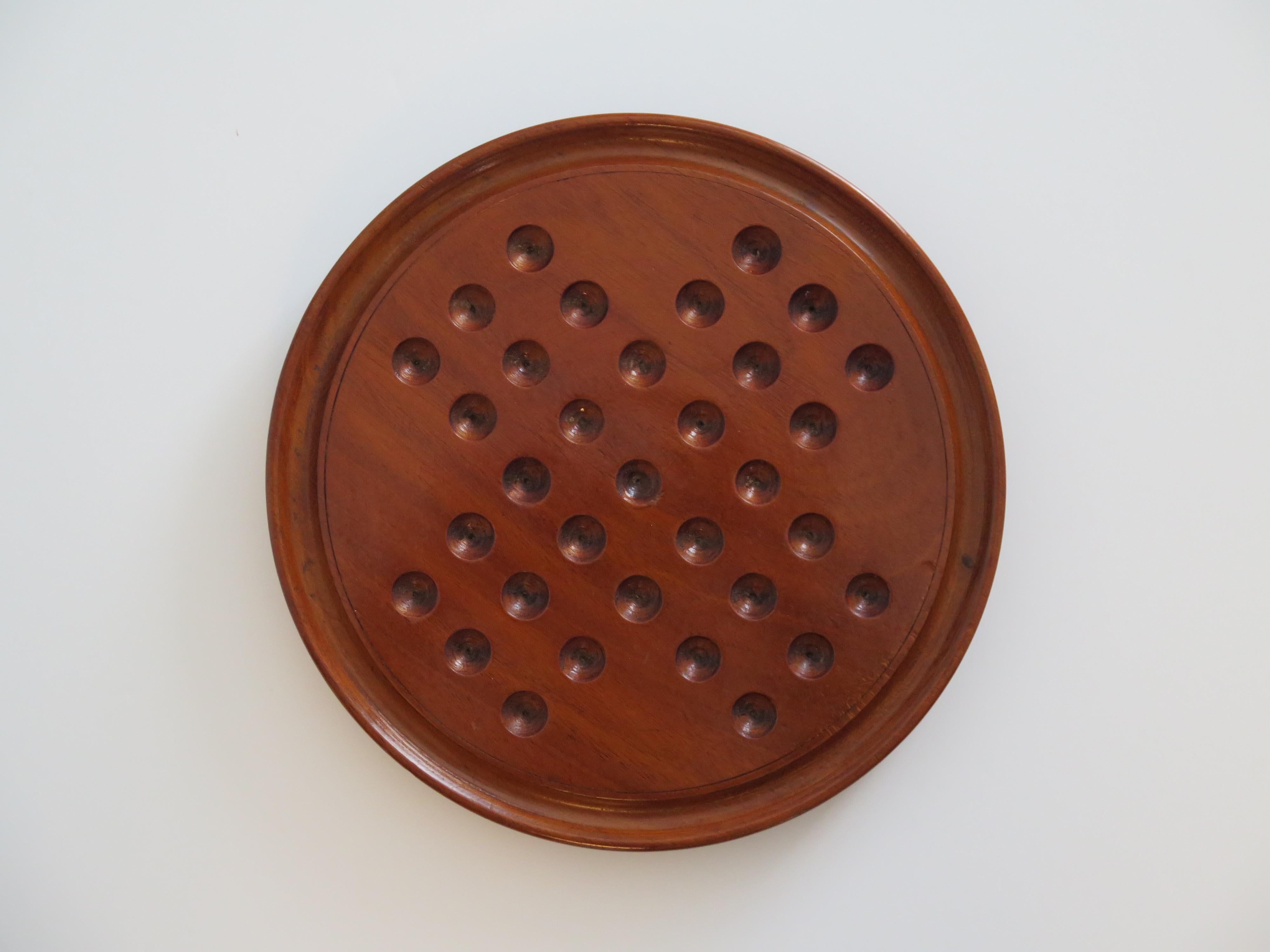 Marble Solitaire Fine Hardwood Board with 33 Clay and Stone Marbles, Late 19th C 1
