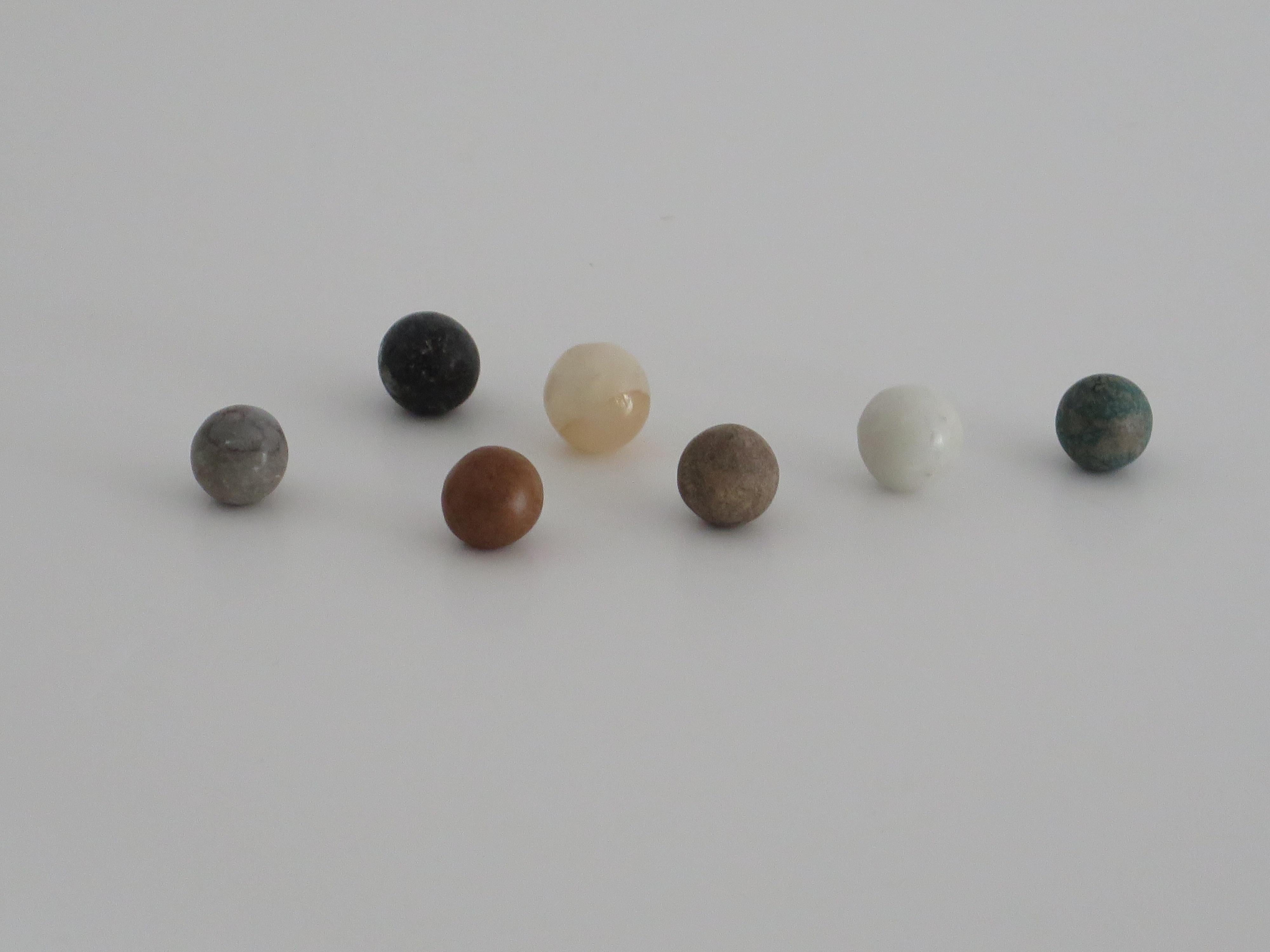 Marble Solitaire Game 10 inch Hardwood Board 35 mixed Stone Marbles, circa 1945 For Sale 6