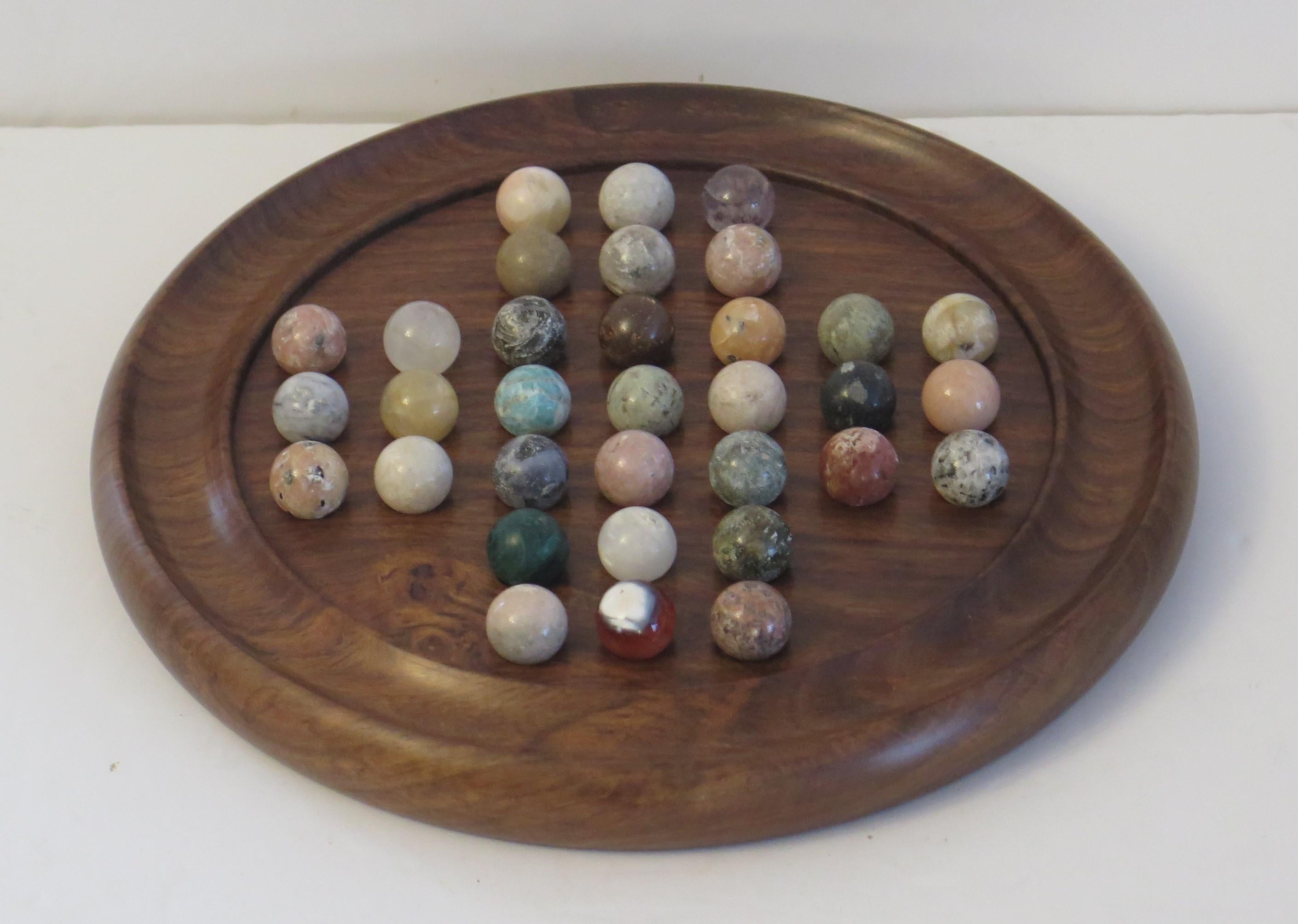board game with marbles and holes