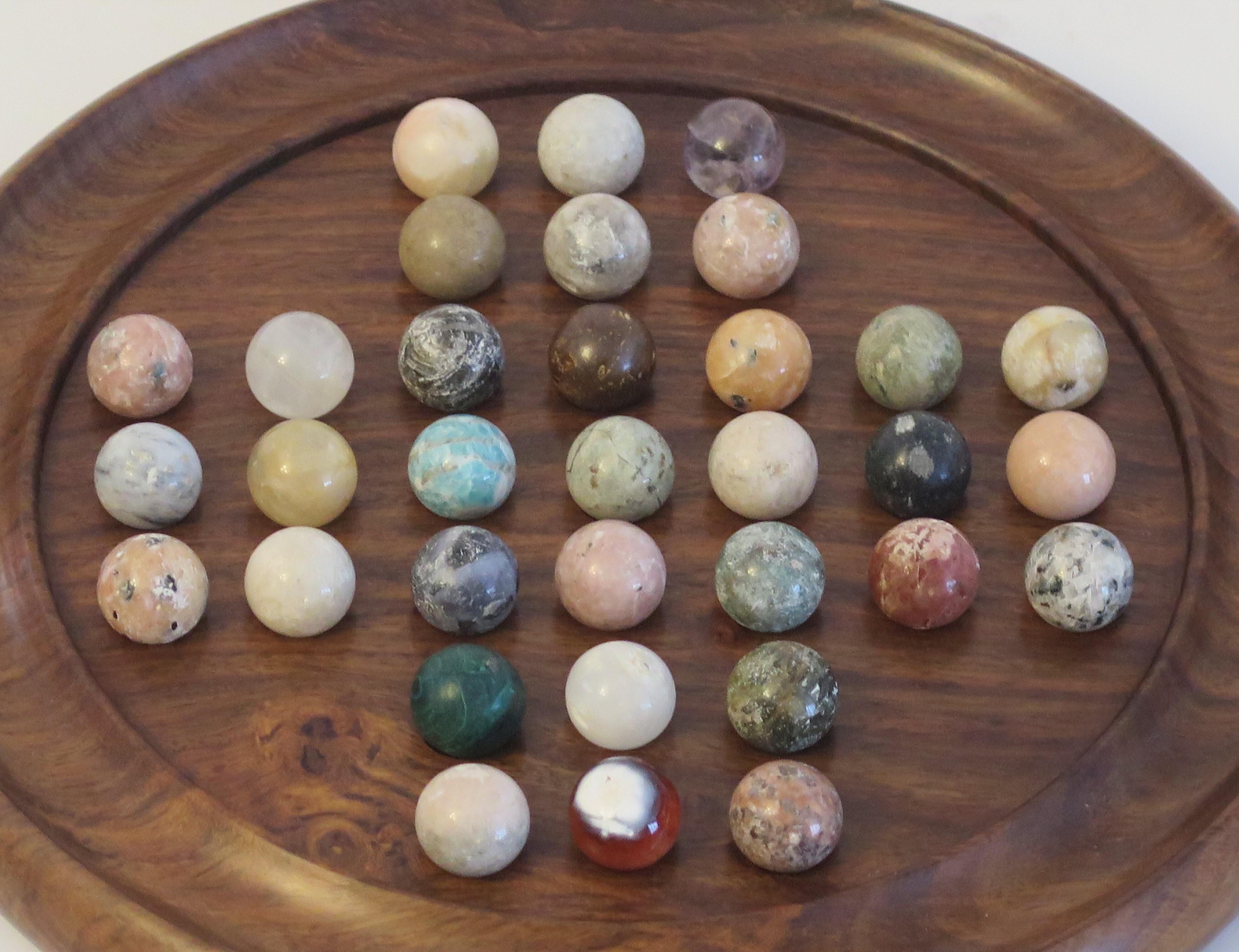Folk Art Marble Solitaire Game Hardwood Board 33 Agate Mineral Stone Marbles, circa 1930s
