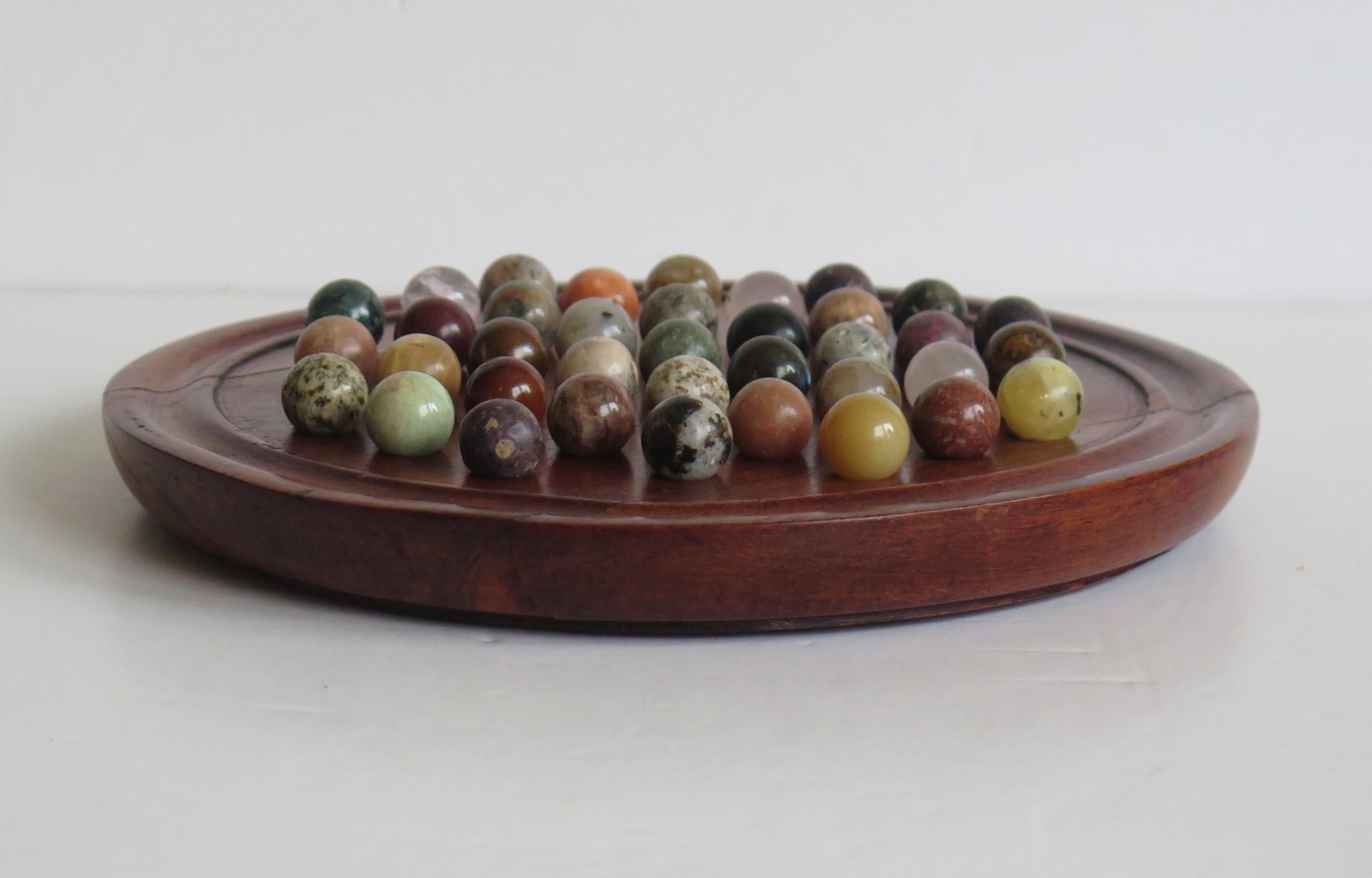 French Marble Solitaire Game Hardwood Board 37 Agate Mineral Stone Marbles, circa 1915