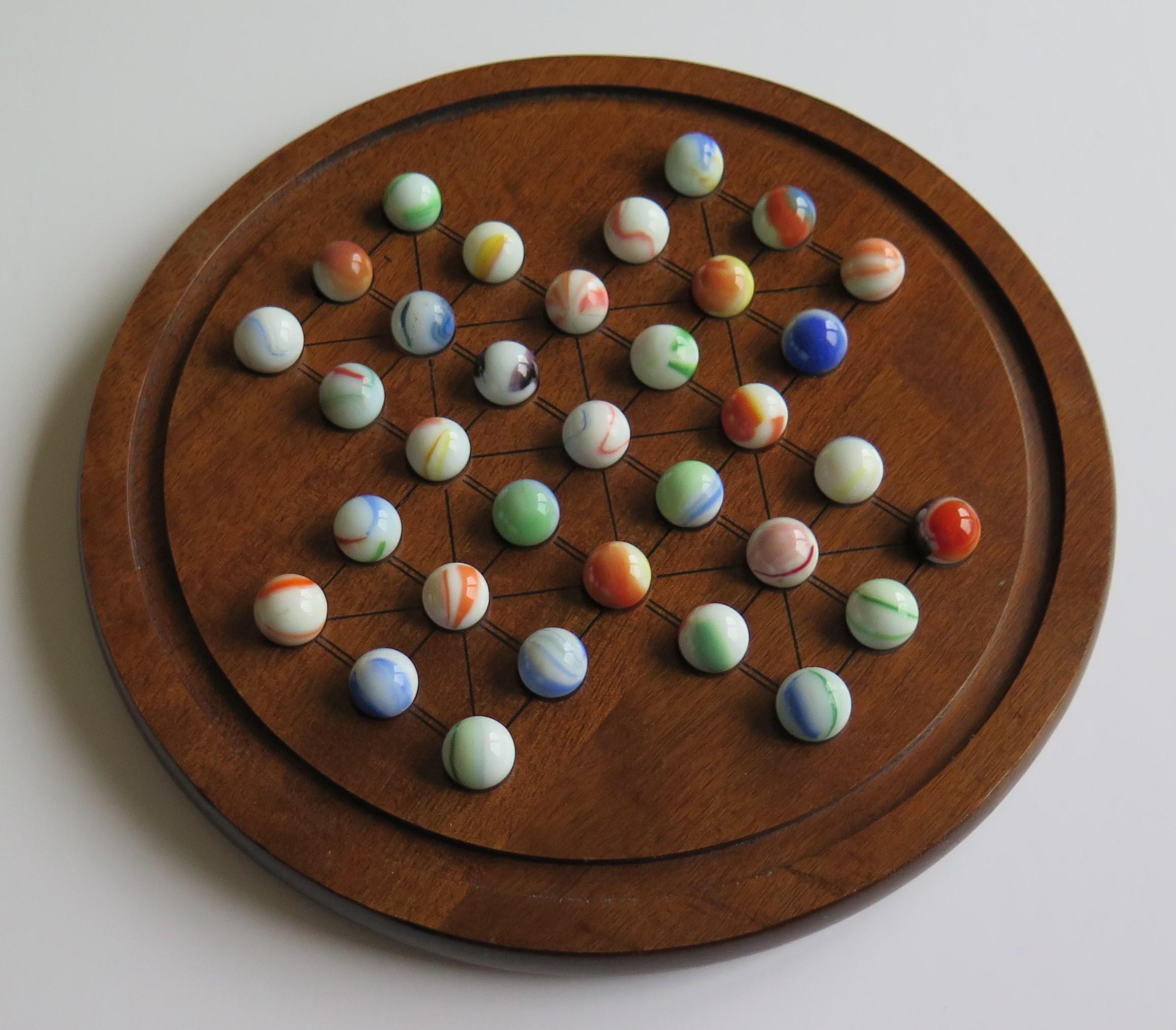 Folk Art Marble Solitaire Game Hardwood Board with 33 Old Glass swirl Marbles