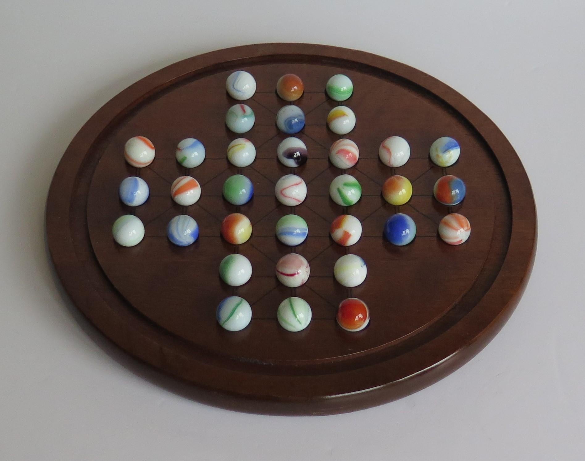 English Marble Solitaire Game Hardwood Board with 33 Old Glass swirl Marbles